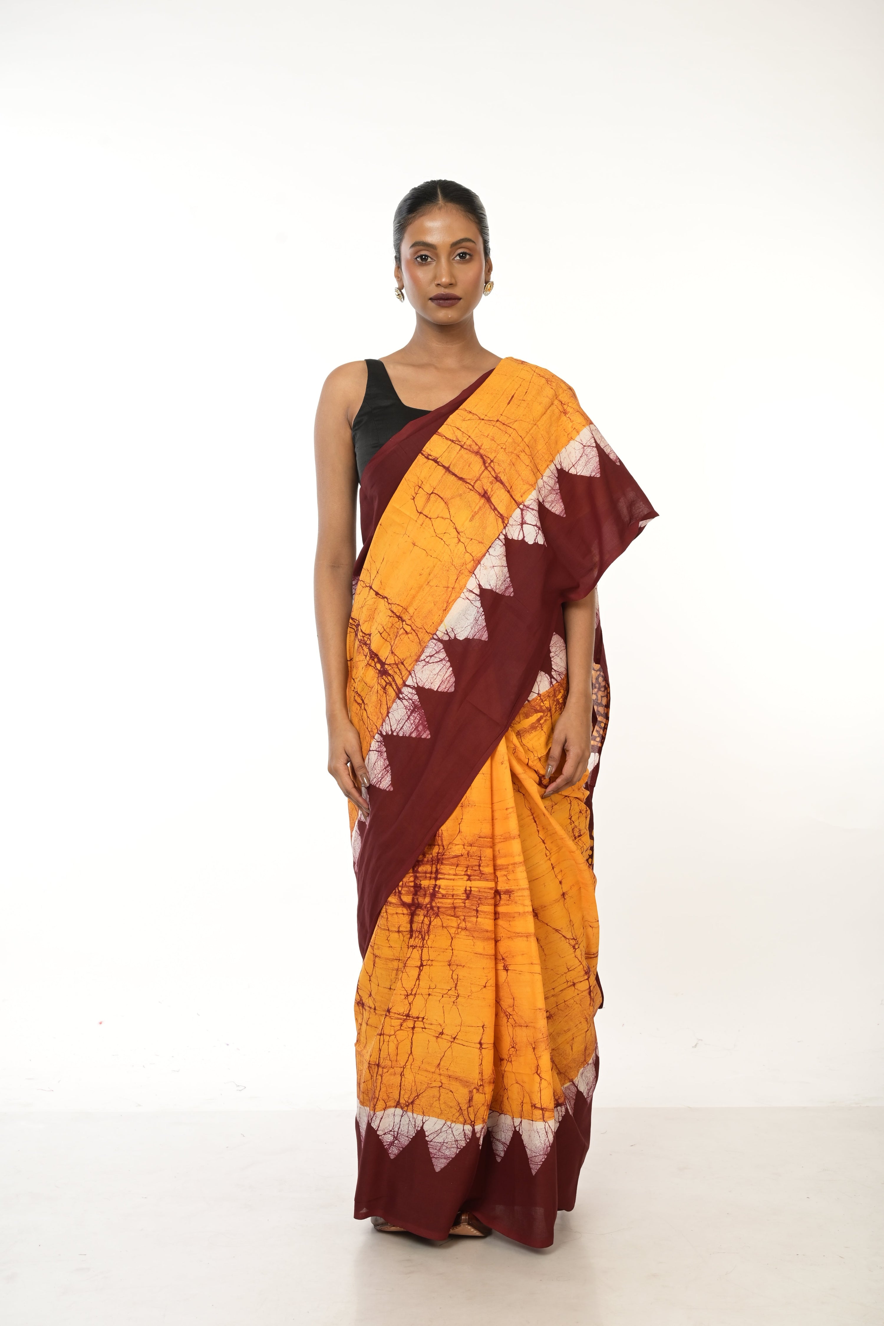 Dishani I Golden Yellow Handloom Batik Printed saree with maroon border