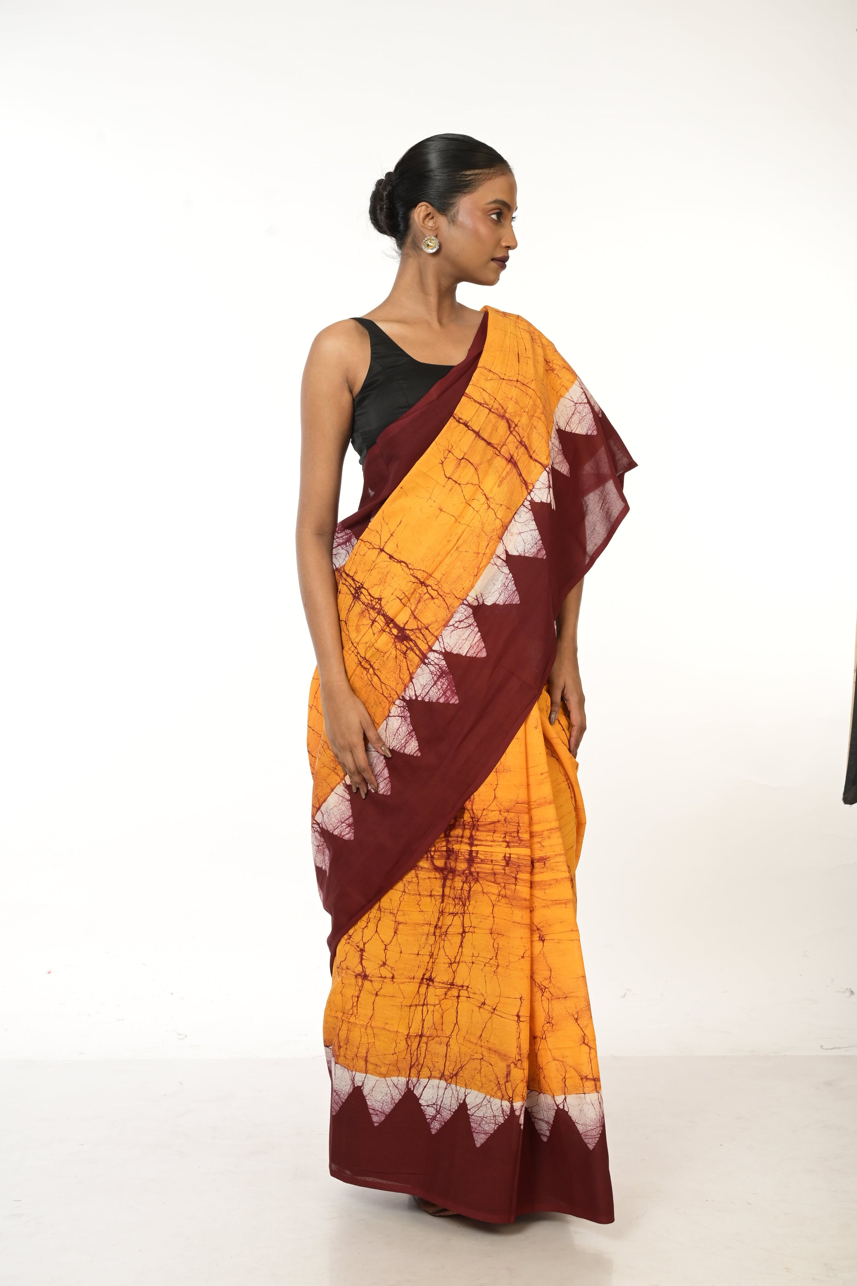 Dishani I Golden Yellow Handloom Batik Printed saree with maroon border