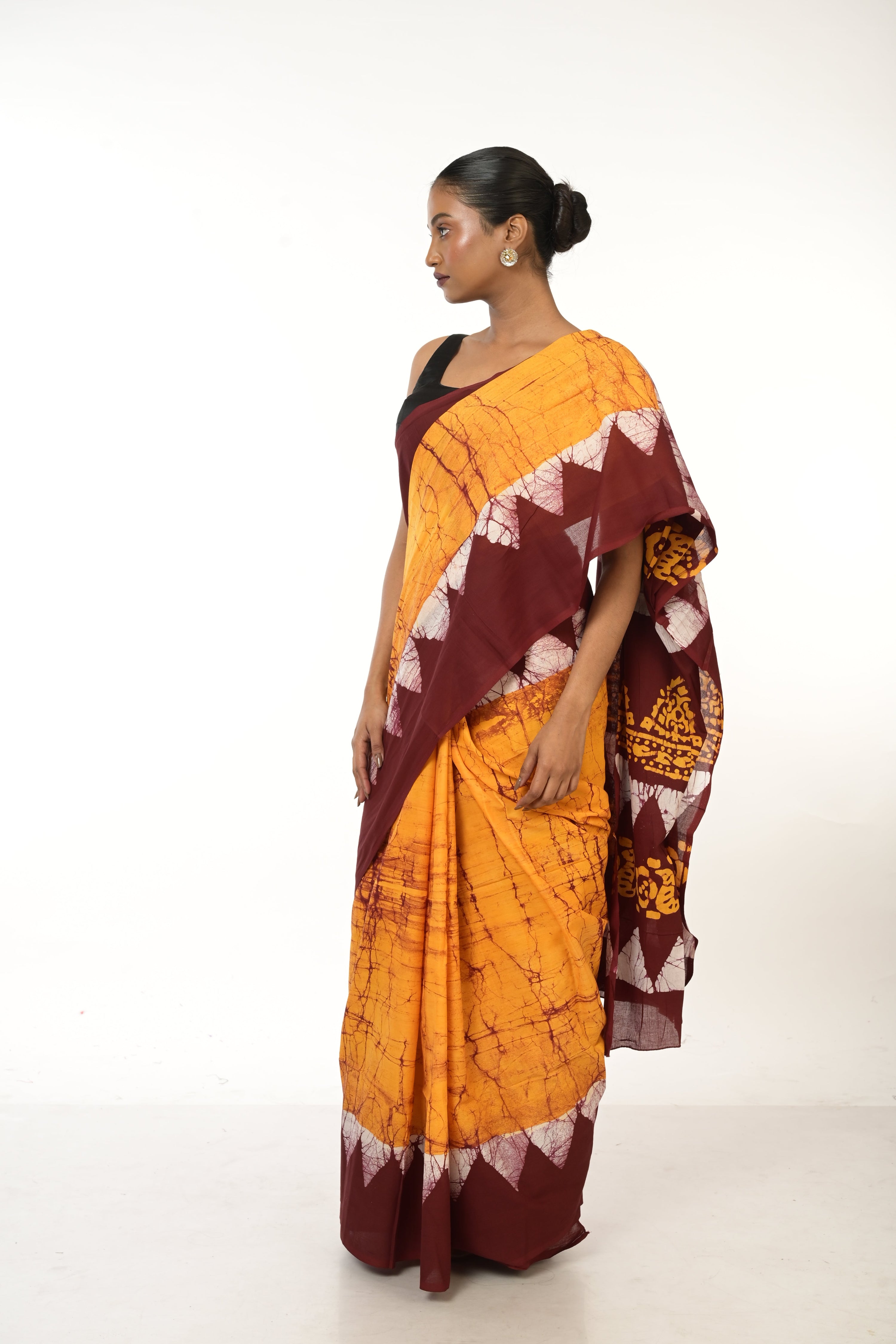 Dishani I Golden Yellow Handloom Batik Printed saree with maroon border