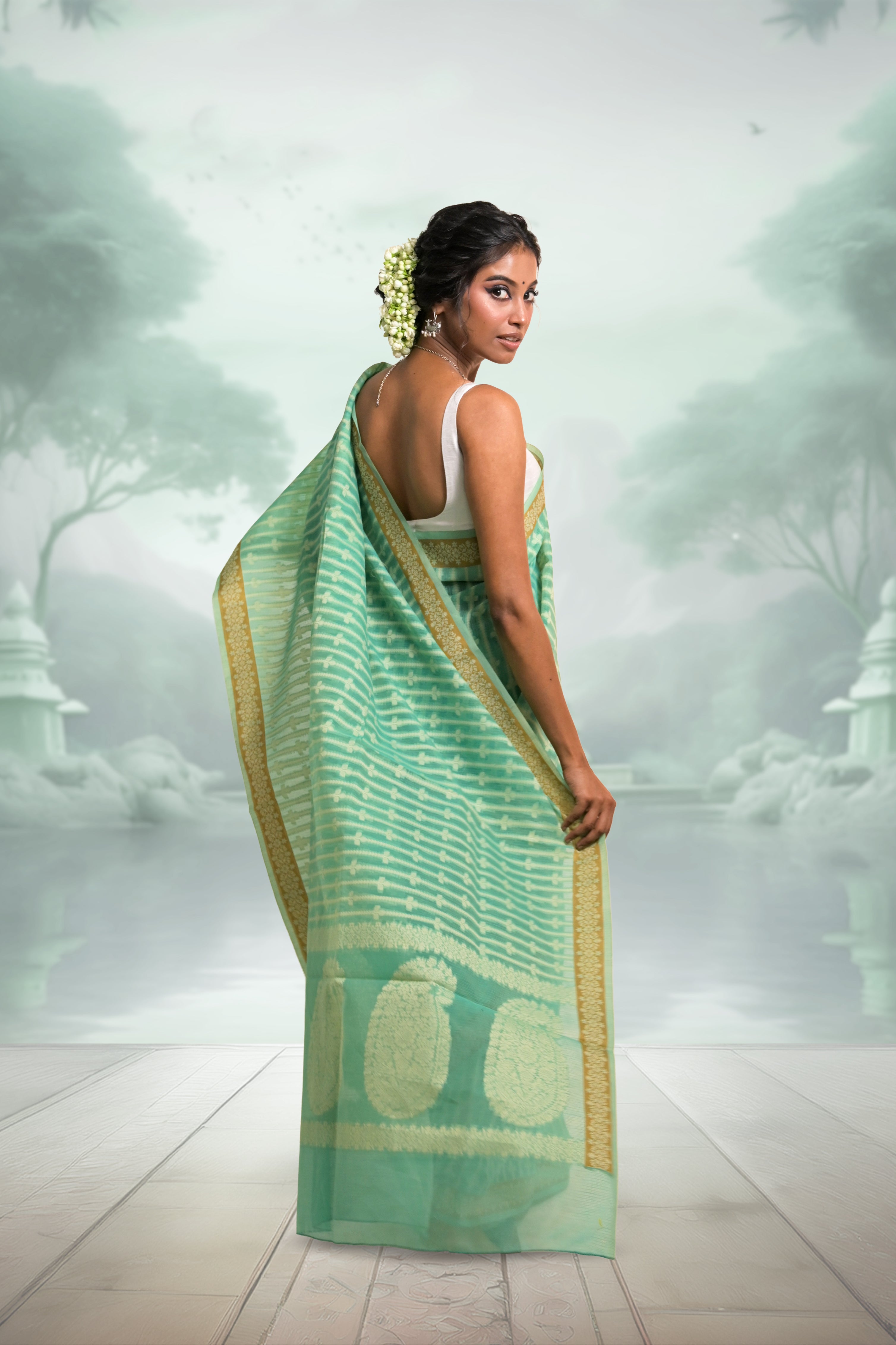 Amaaya I Sea Green Handloom Cotton Banarasi Saree with Floral Border and striped leave vines