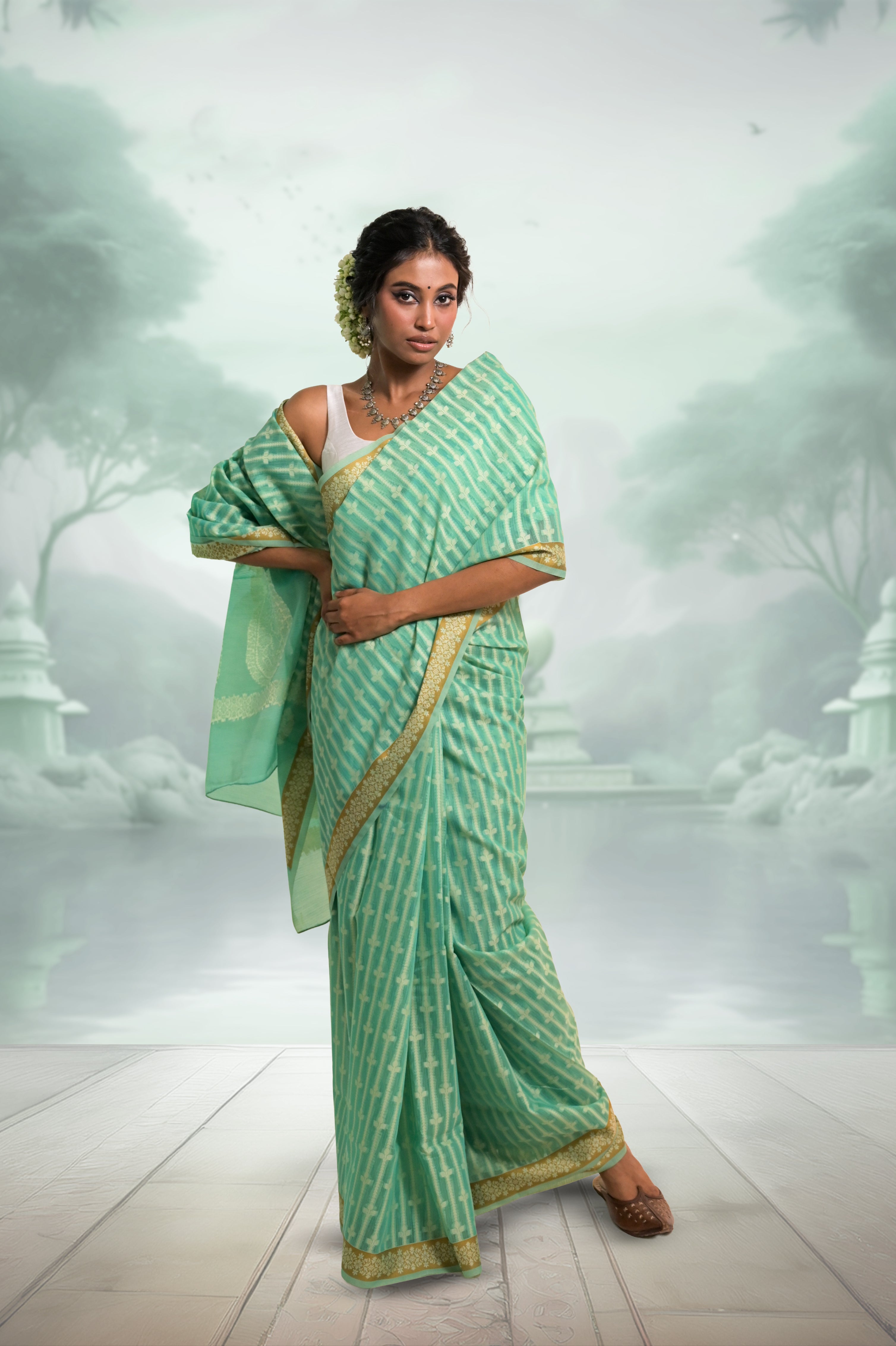 Amaaya I Sea Green Handloom Cotton Banarasi Saree with Floral Border and striped leave vines