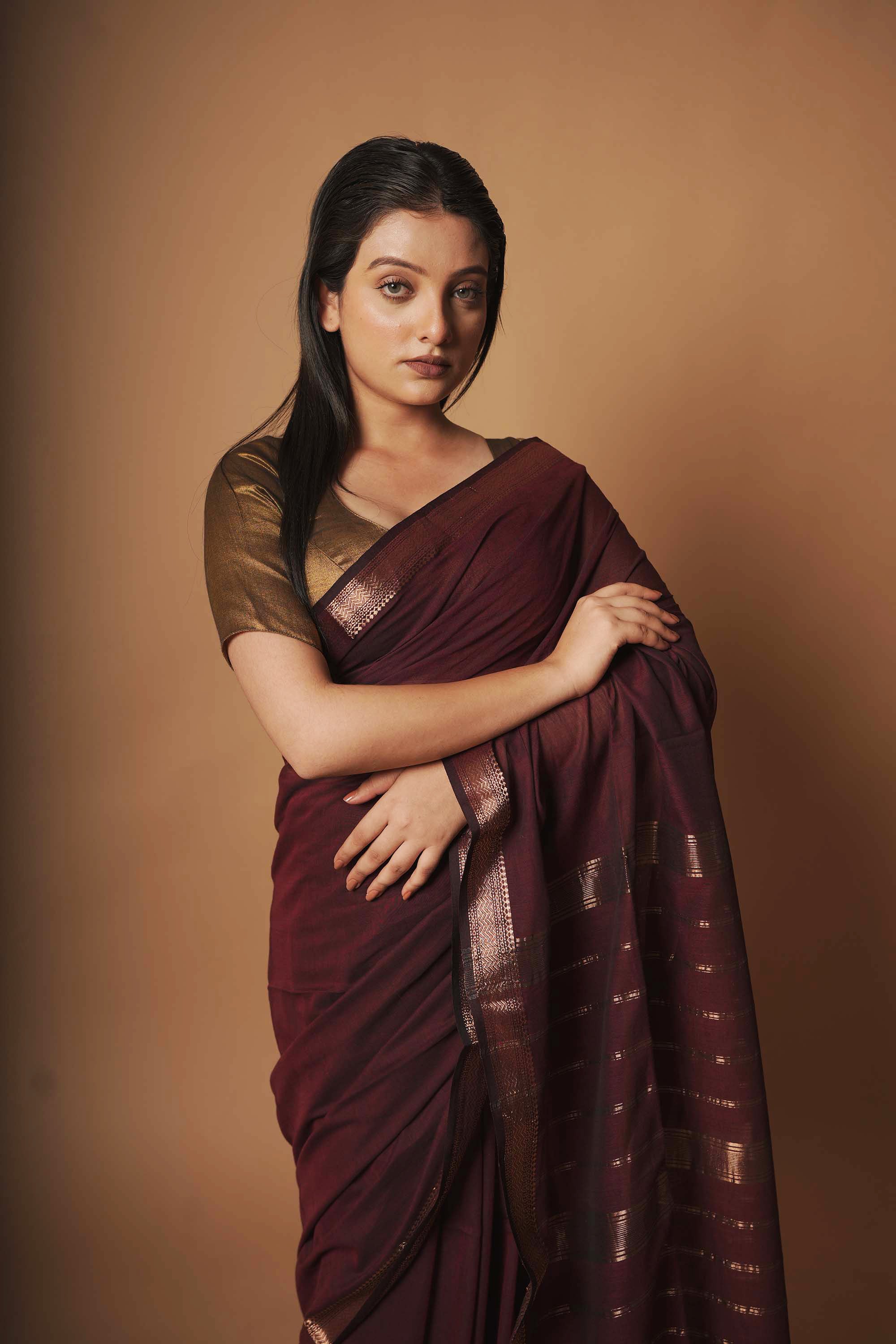 Ruby splendour I Maroon handloom cotton saree with  zari border