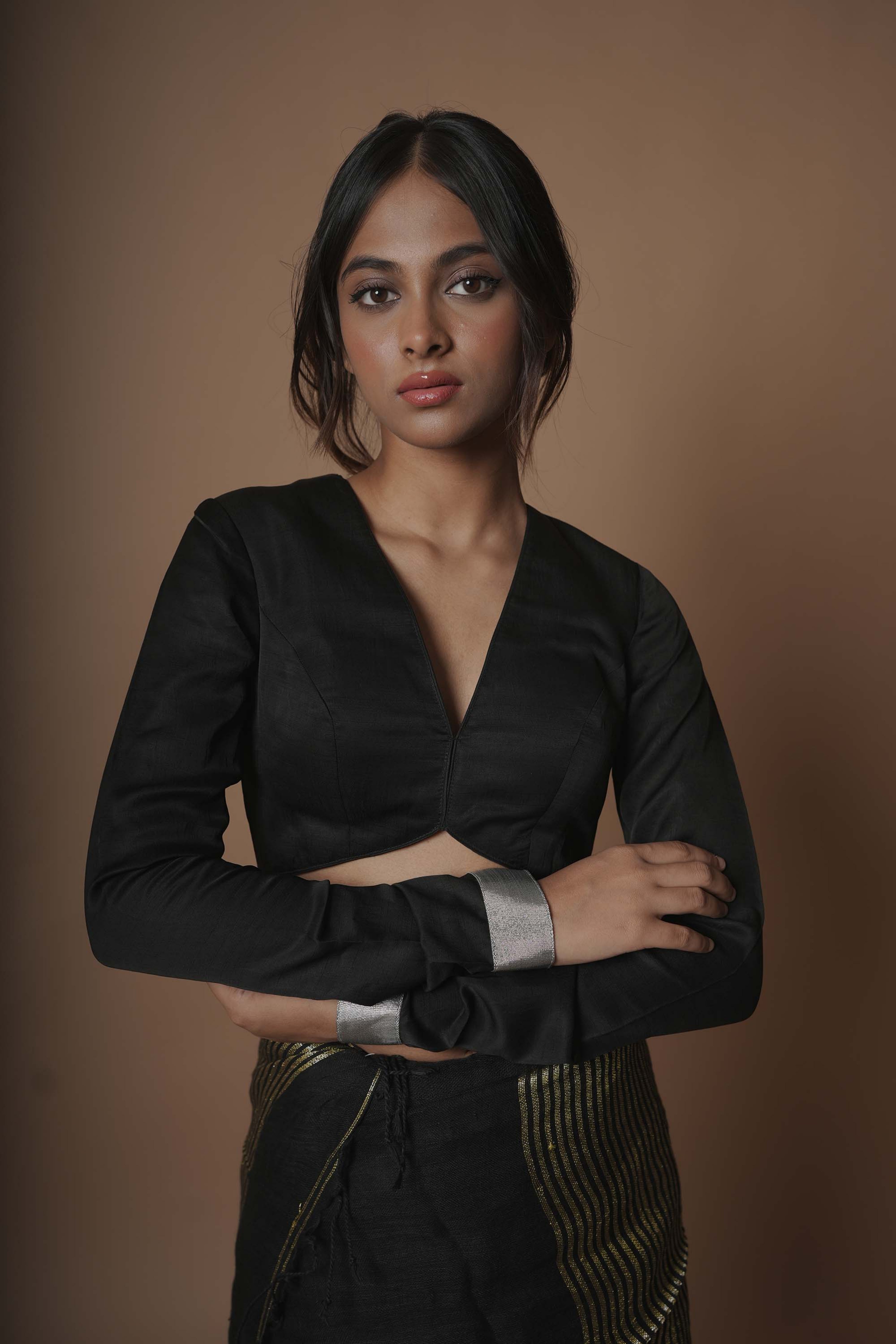 black-silk-plunging-neck-blouse-with-silver-border-on-sleeves