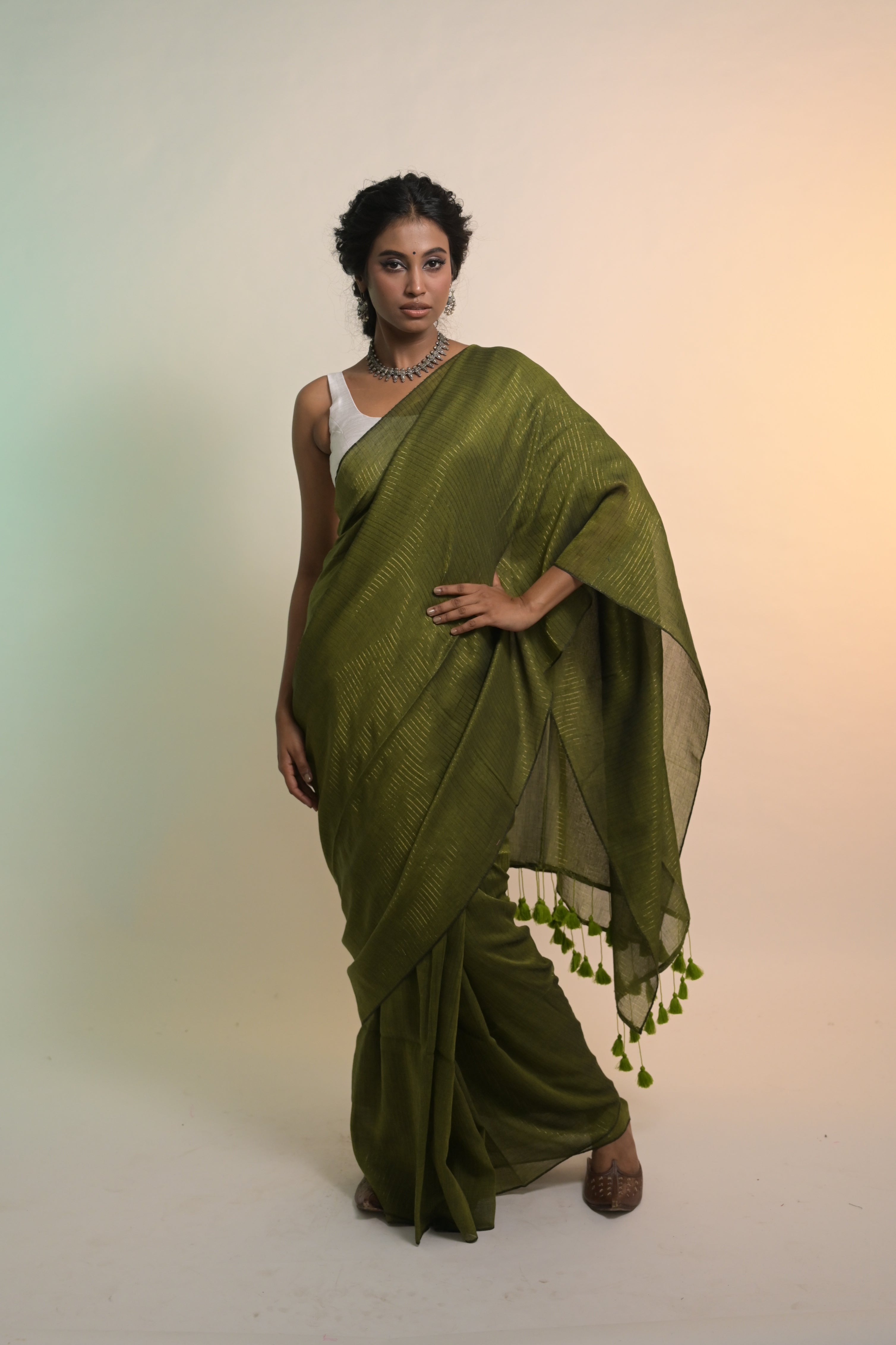 Kanak I Olive Green Handloom Mul Cotton Saree with Zari Stripes