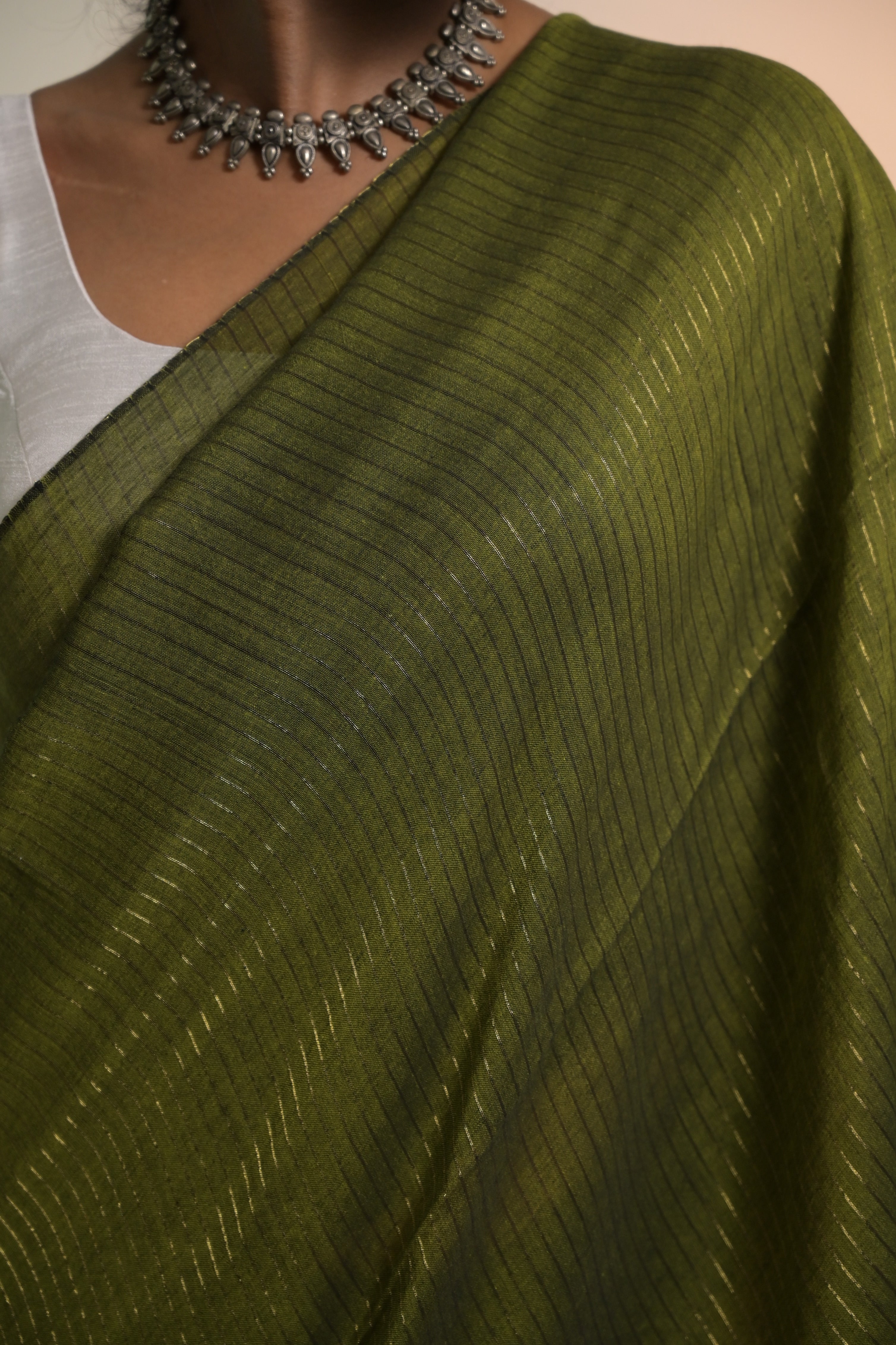 Kanak I Olive Green Handloom Mul Cotton Saree with Zari Stripes