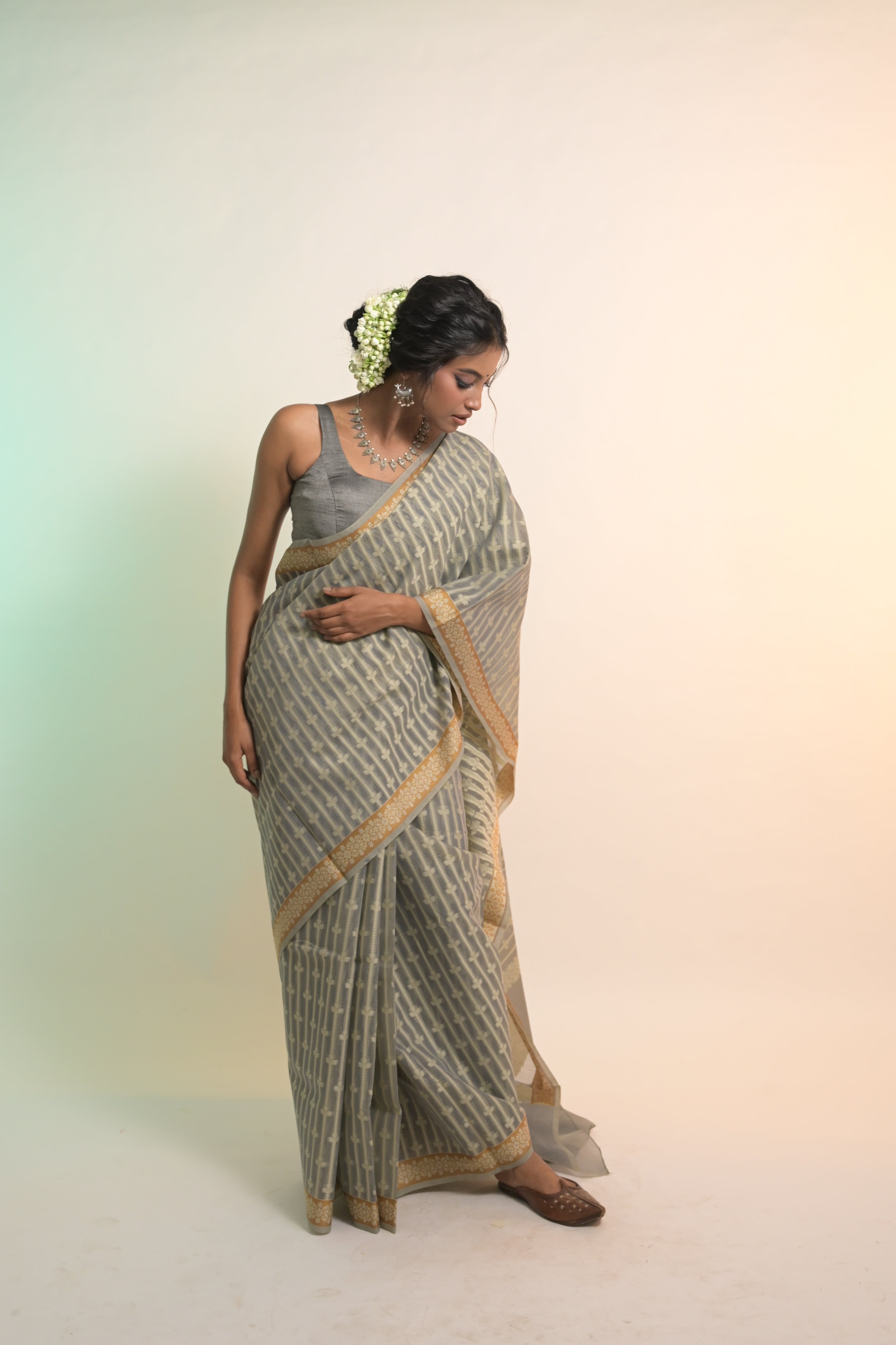 Nivaah I Grey Handloom Cotton Banarasi Saree with Floral Border and striped leave vines