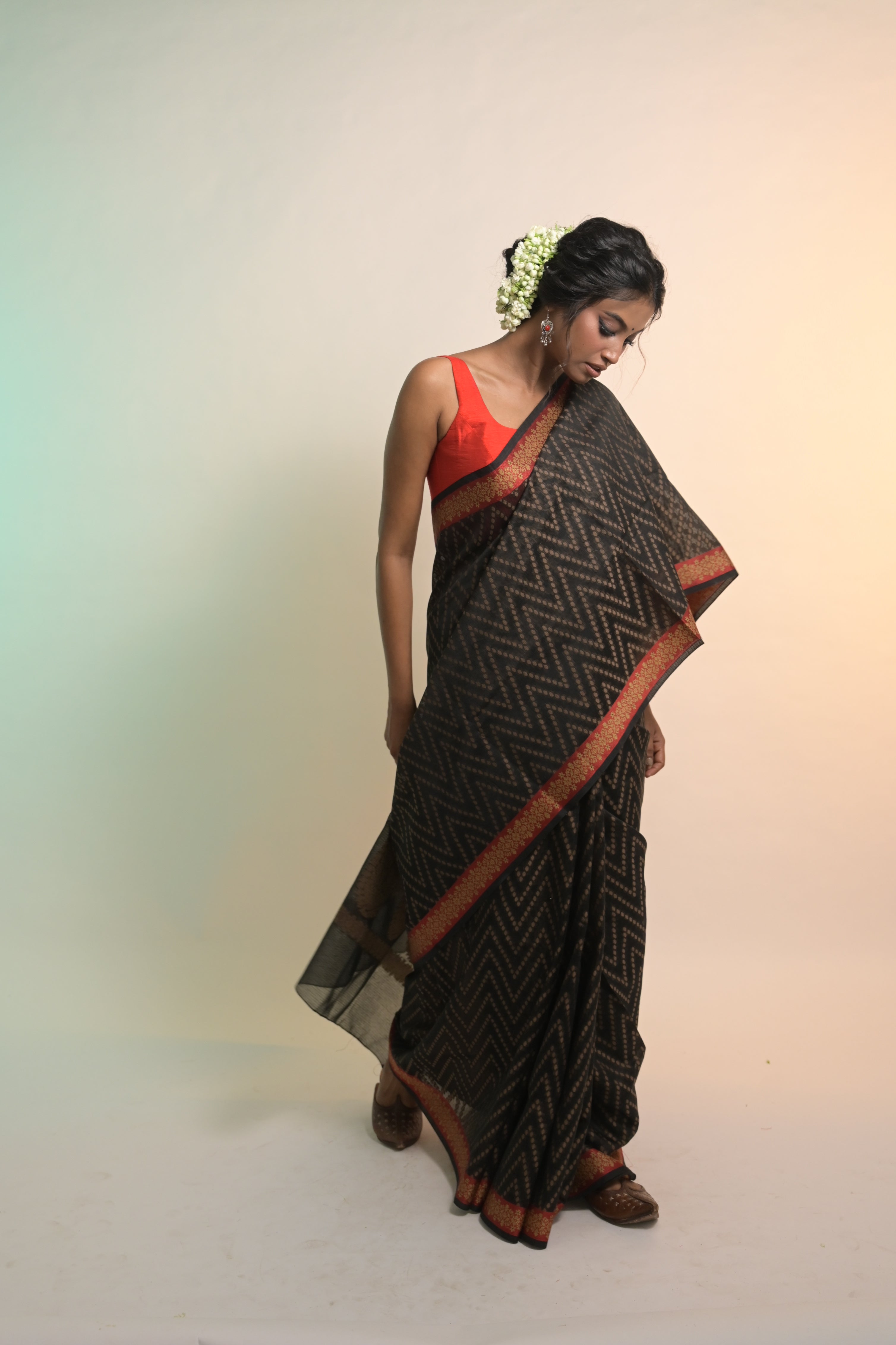 Ruchika I Black Handloom Cotton Saree with Floral Banarasi Border