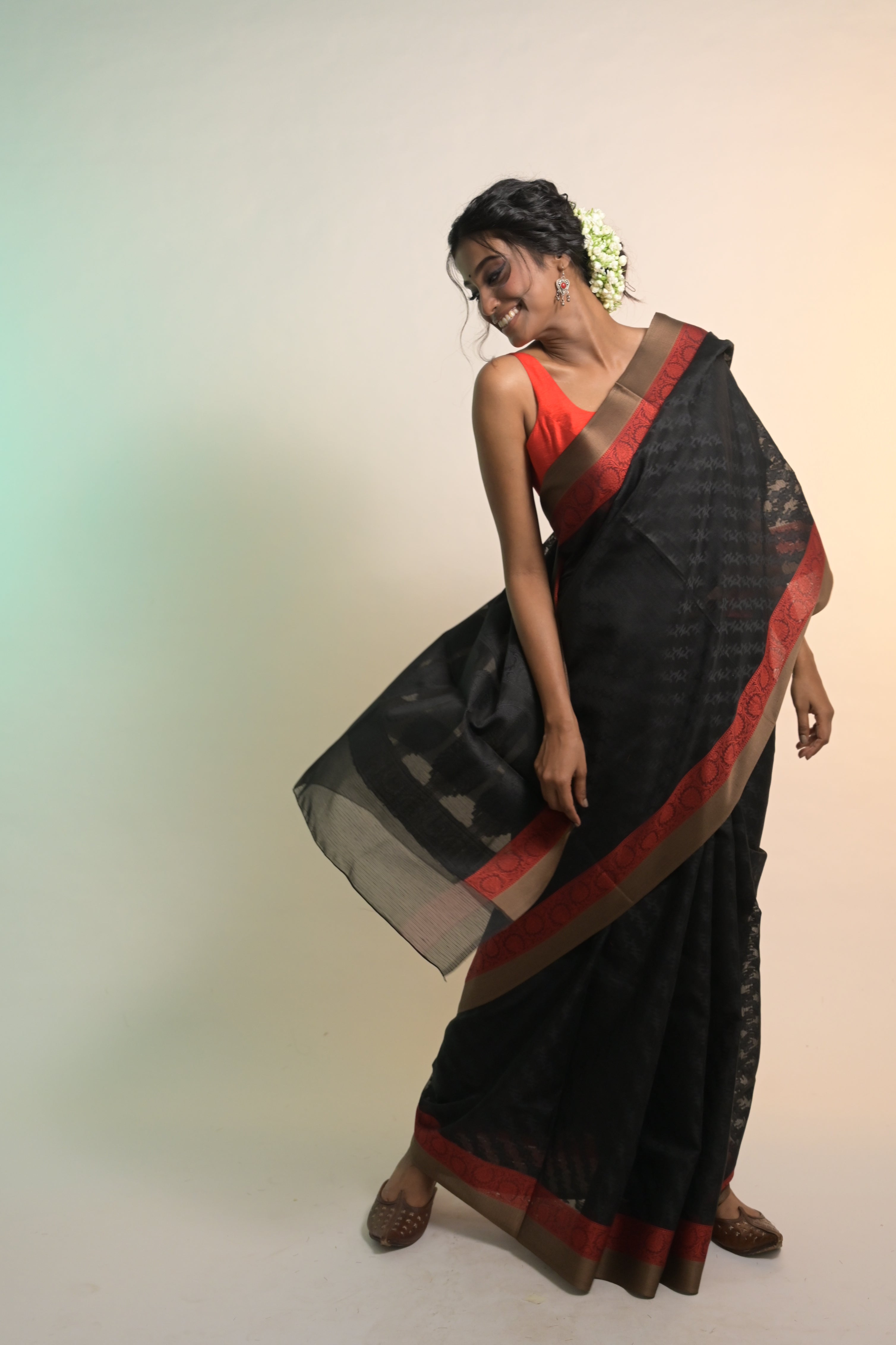 Nirvana I Black Handloom Cotton Saree with Red Floral Border