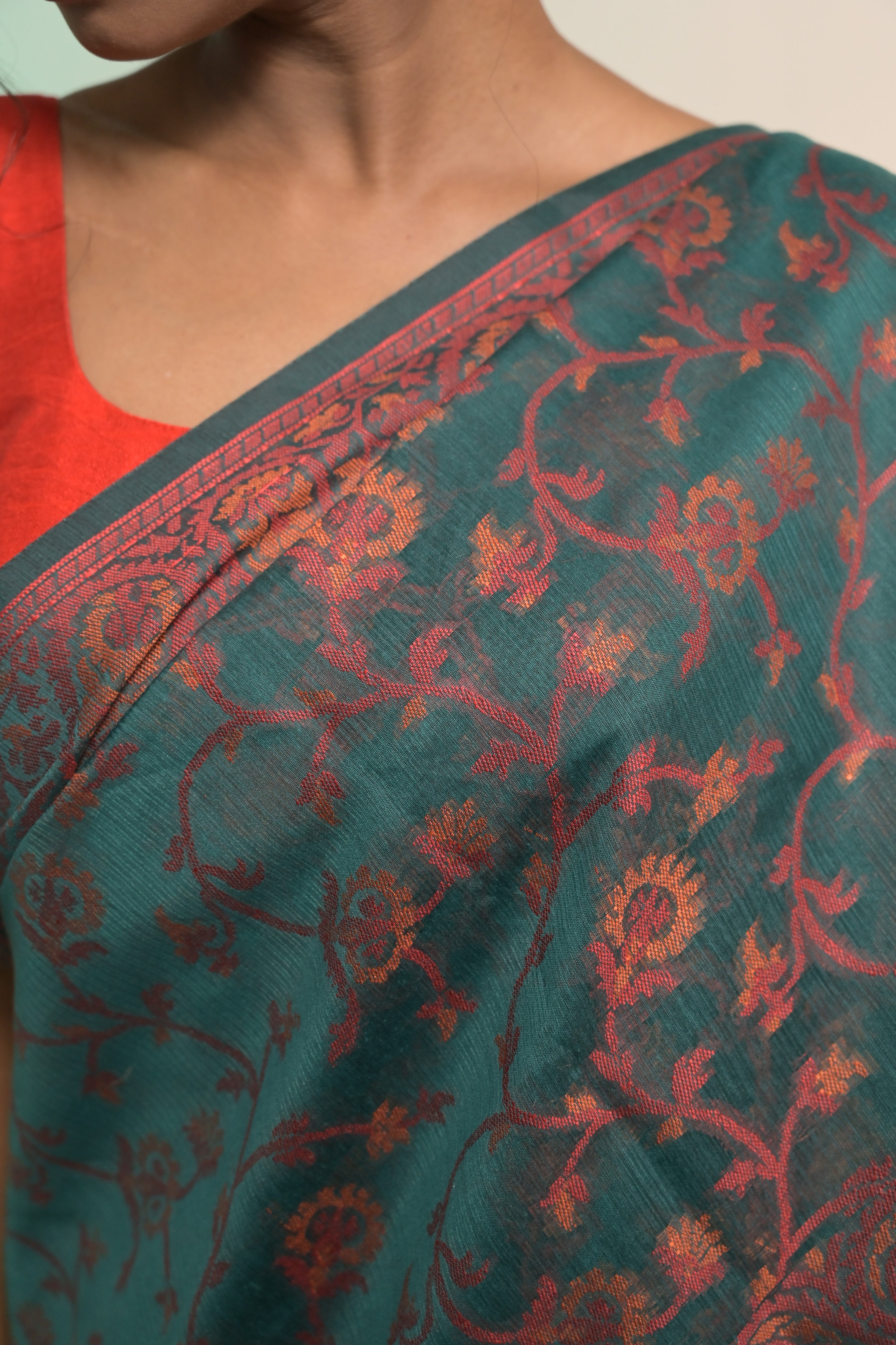 Aahana I Green Handloom Cotton Saree with Ochre Floral Jaal Motifs