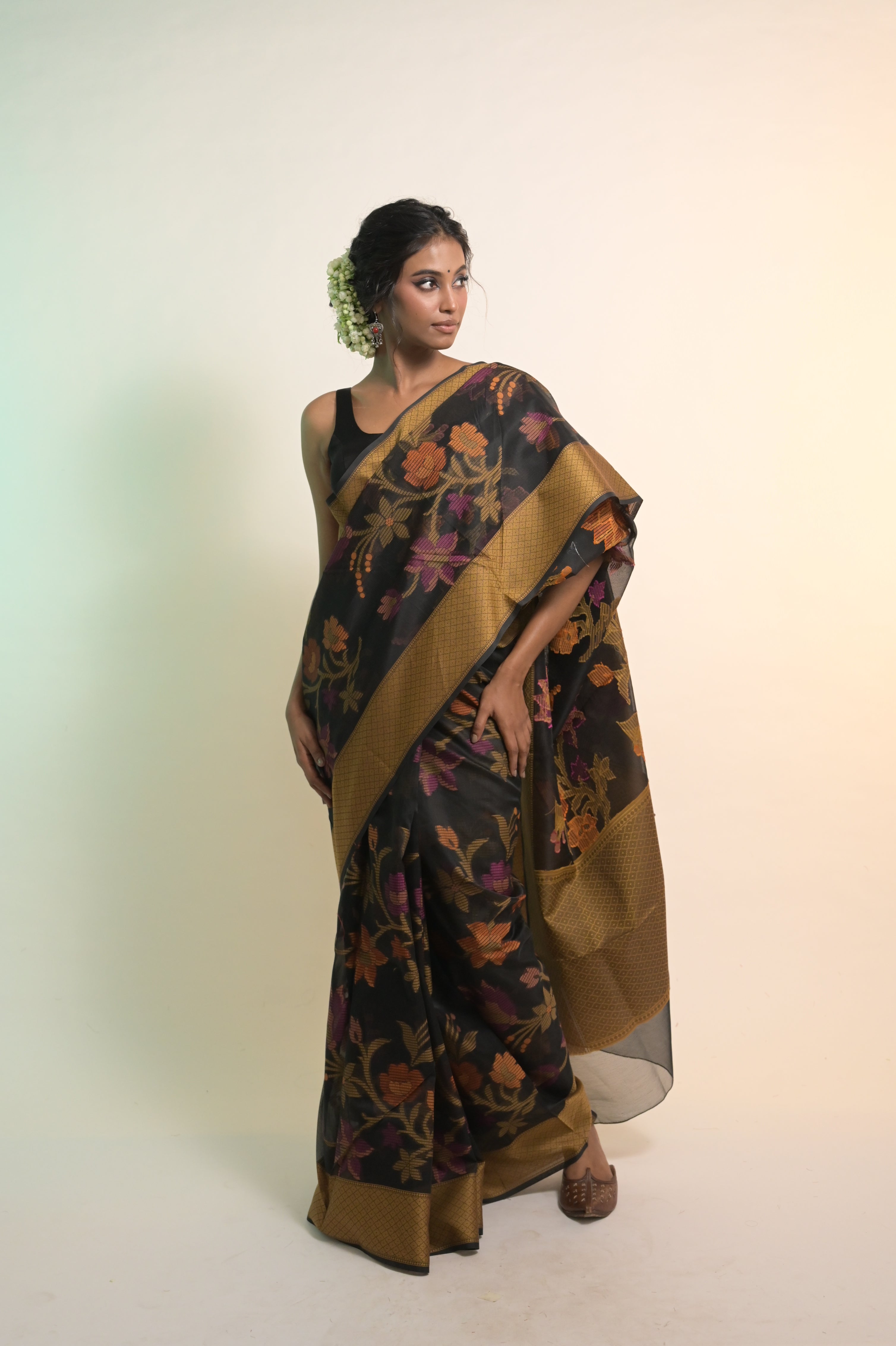 Suvanya I Black Handloom Cotton Saree with Multicolour Floral Jaal Motifs