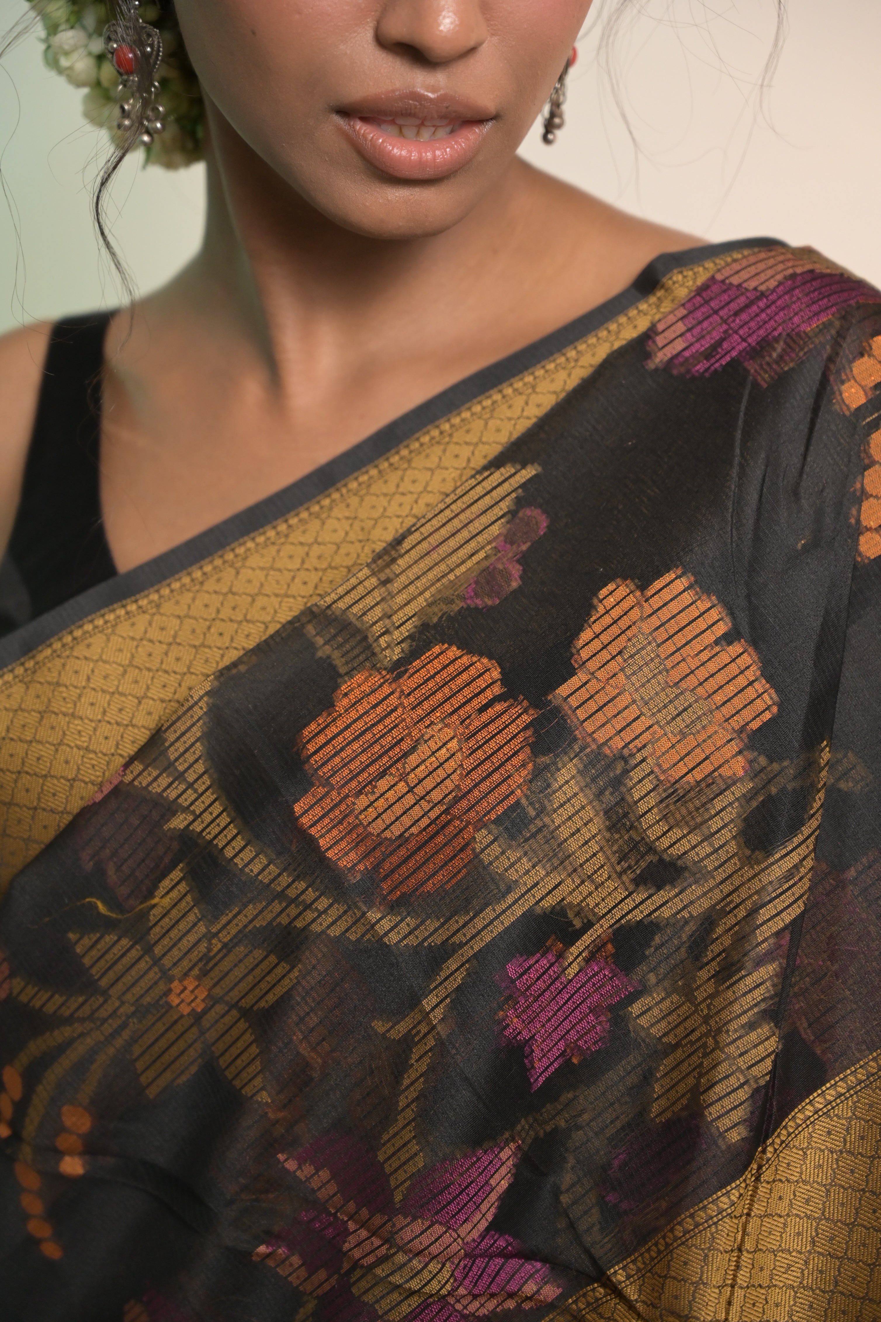 Suvanya I Black Handloom Cotton Saree with Multicolour Floral Jaal Motifs