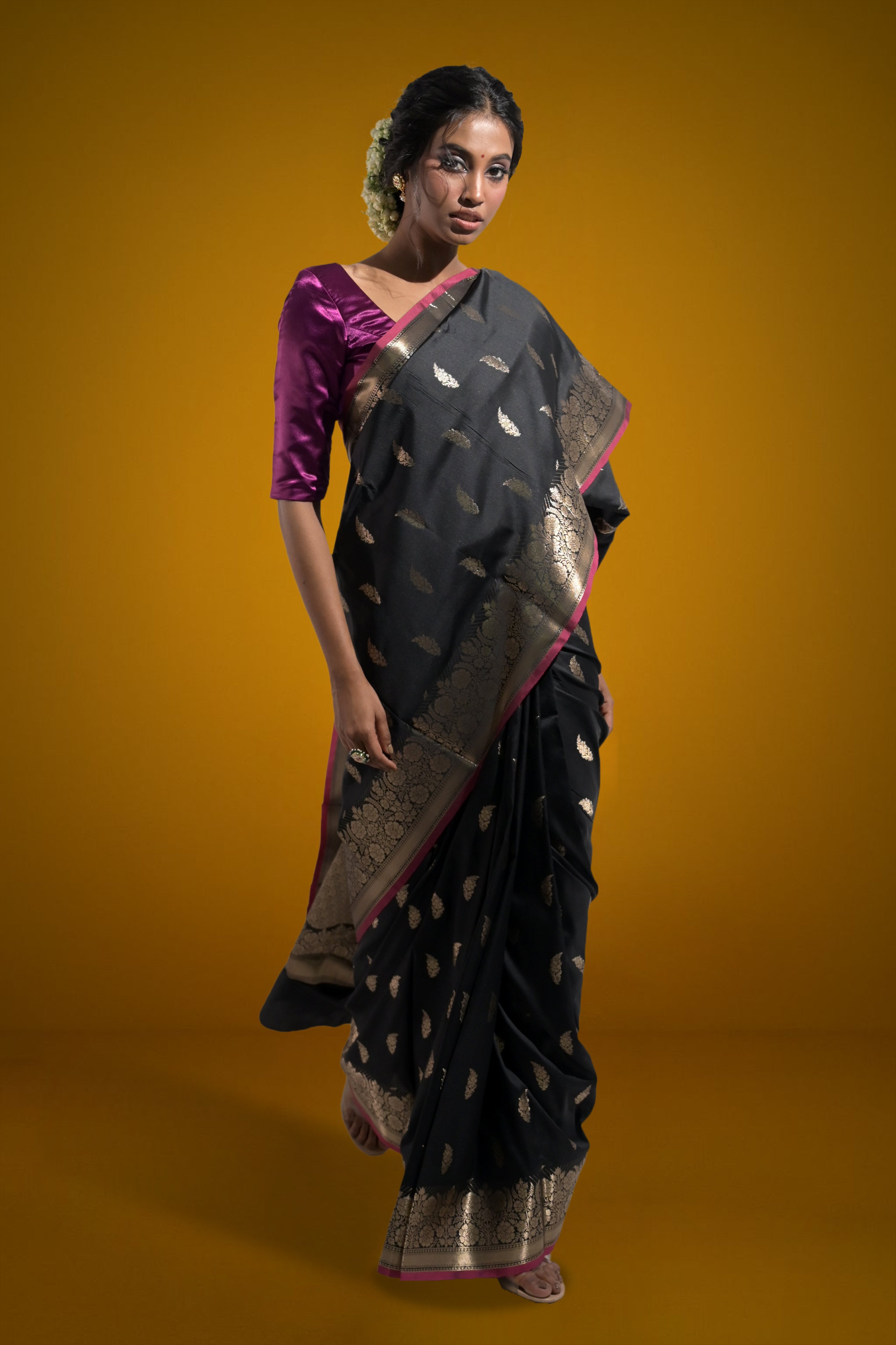 Sargam Sitara I Black Handloom Silk Banarasi Saree with floral zari border and Butis