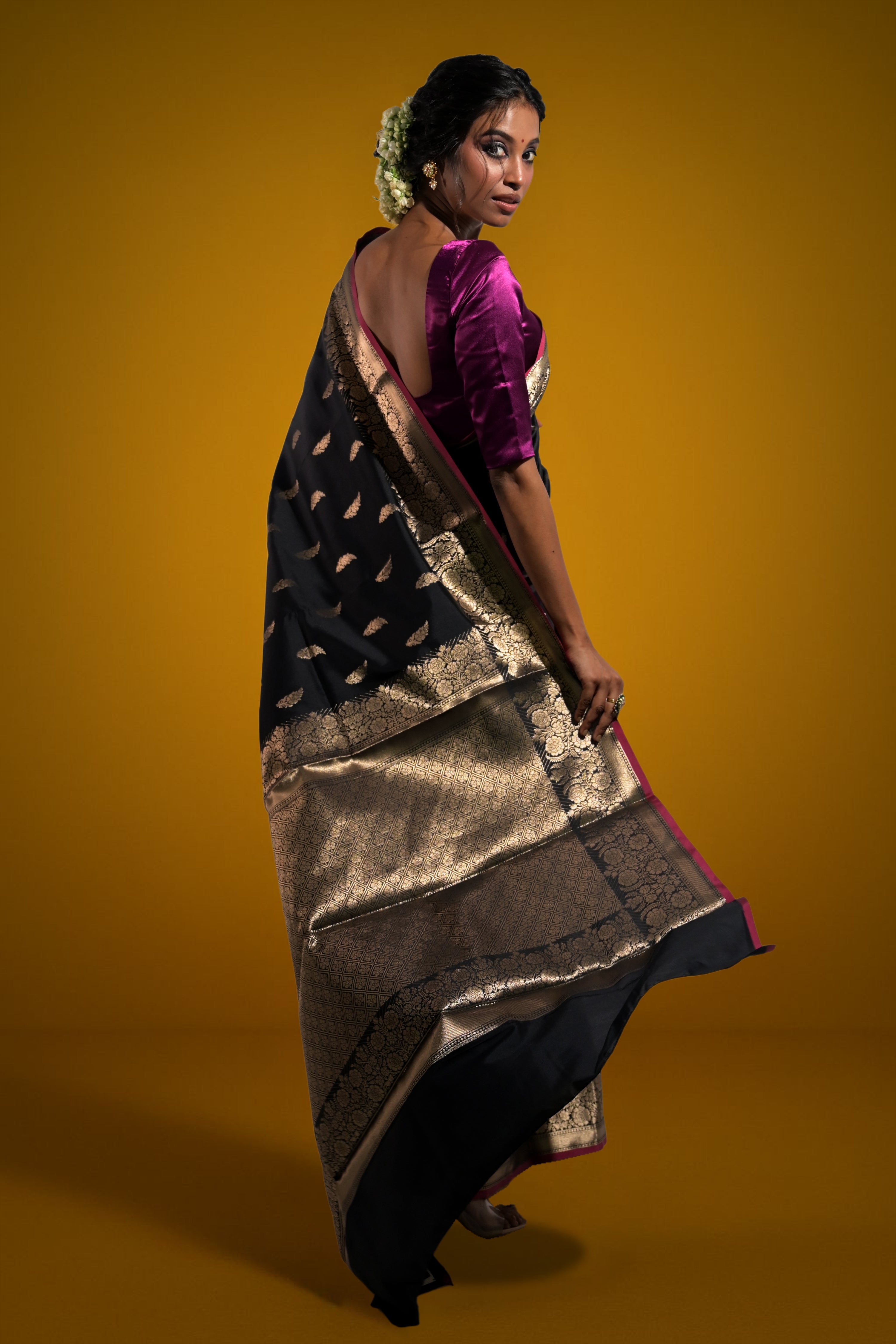 Sargam Sitara I Black Handloom Silk Banarasi Saree with floral zari border and Butis