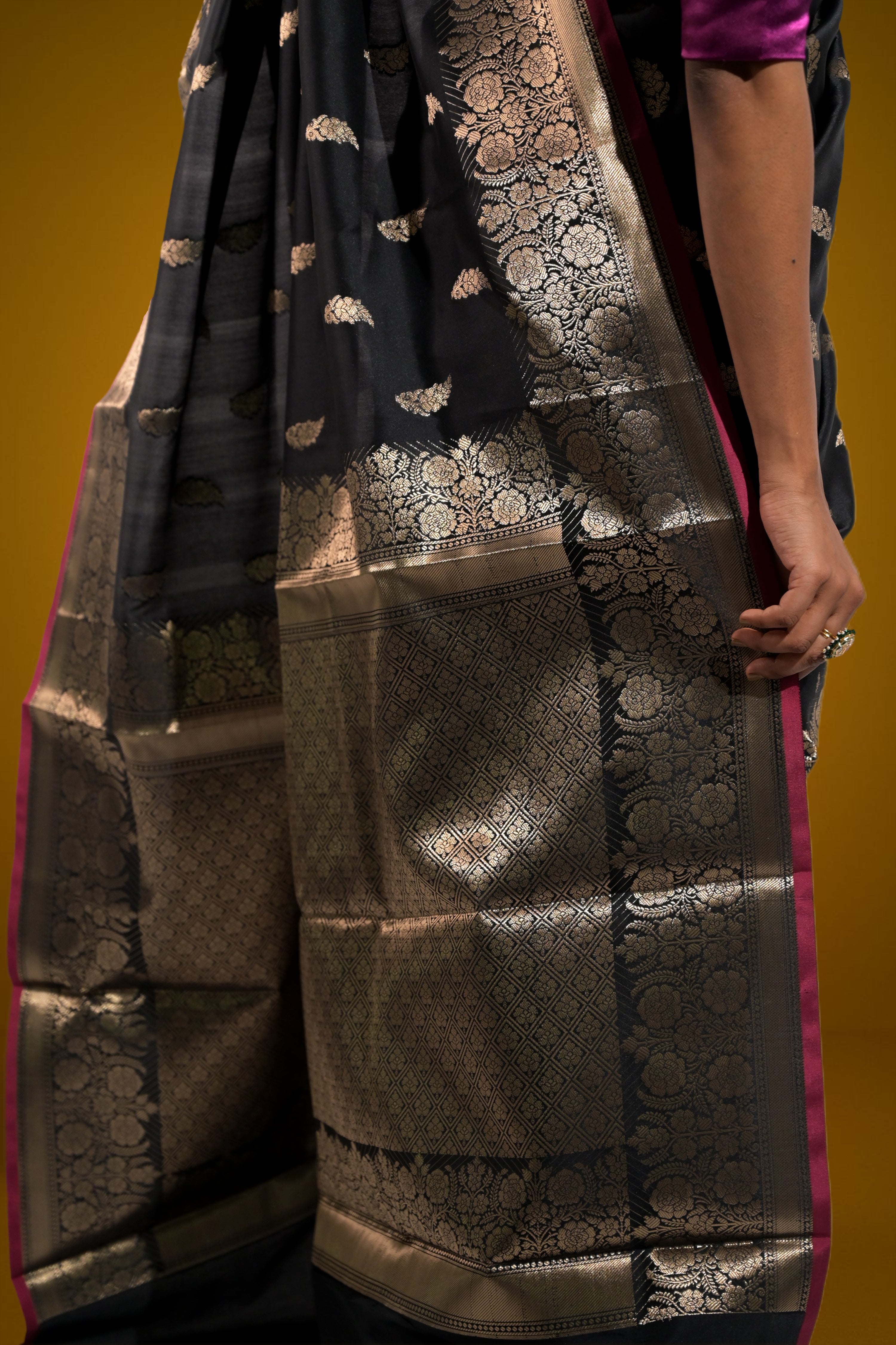 Sargam Sitara I Black Handloom Silk Banarasi Saree with floral zari border and Butis