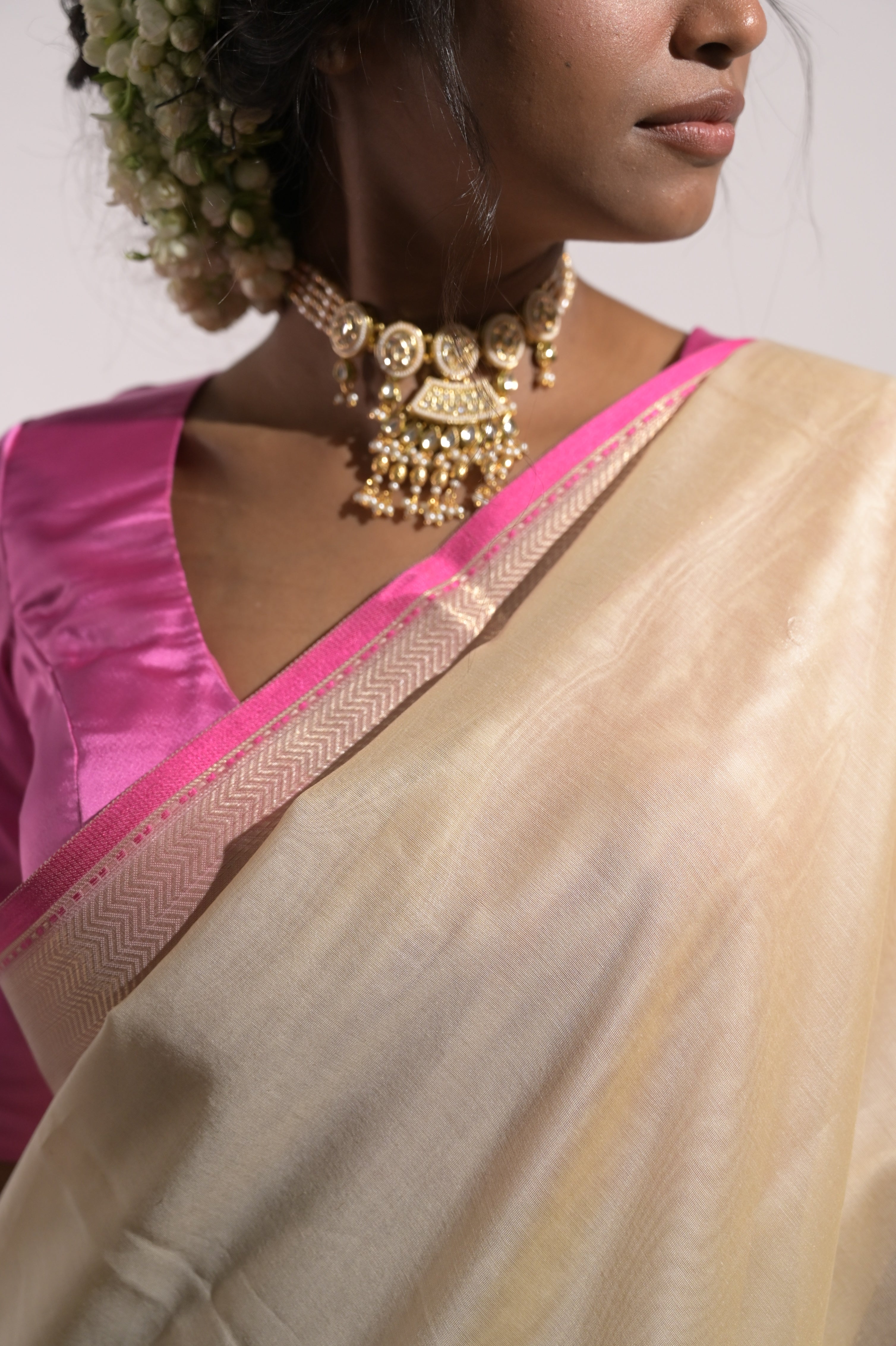 Pallavika I Ivory Handloom Cotton Banarasi Saree with Pink Pallu and floral Motifs