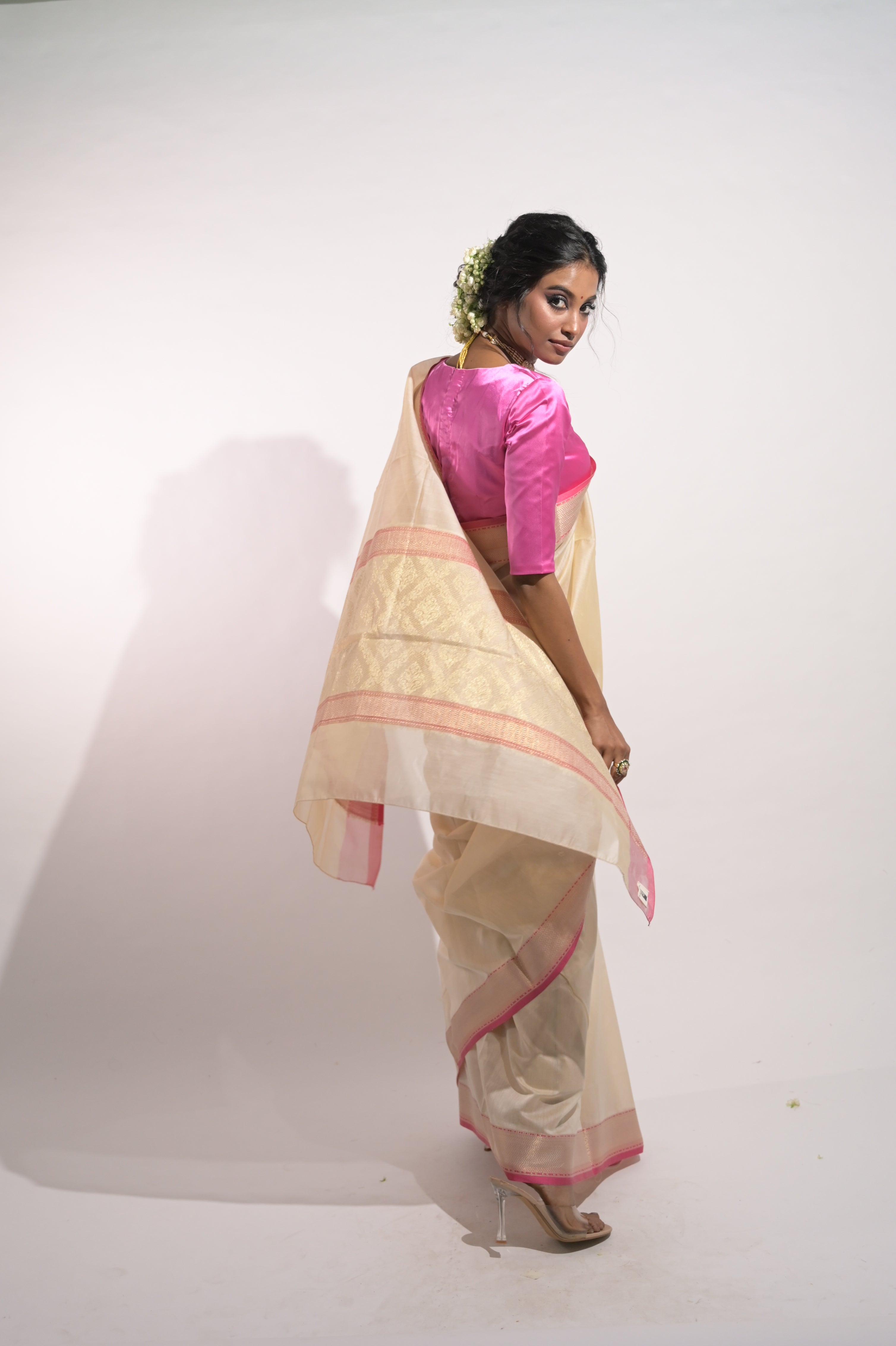 Tanirika I Ivory Handloom Cotton Banarasi Saree with Zari Border and Floral Motifs