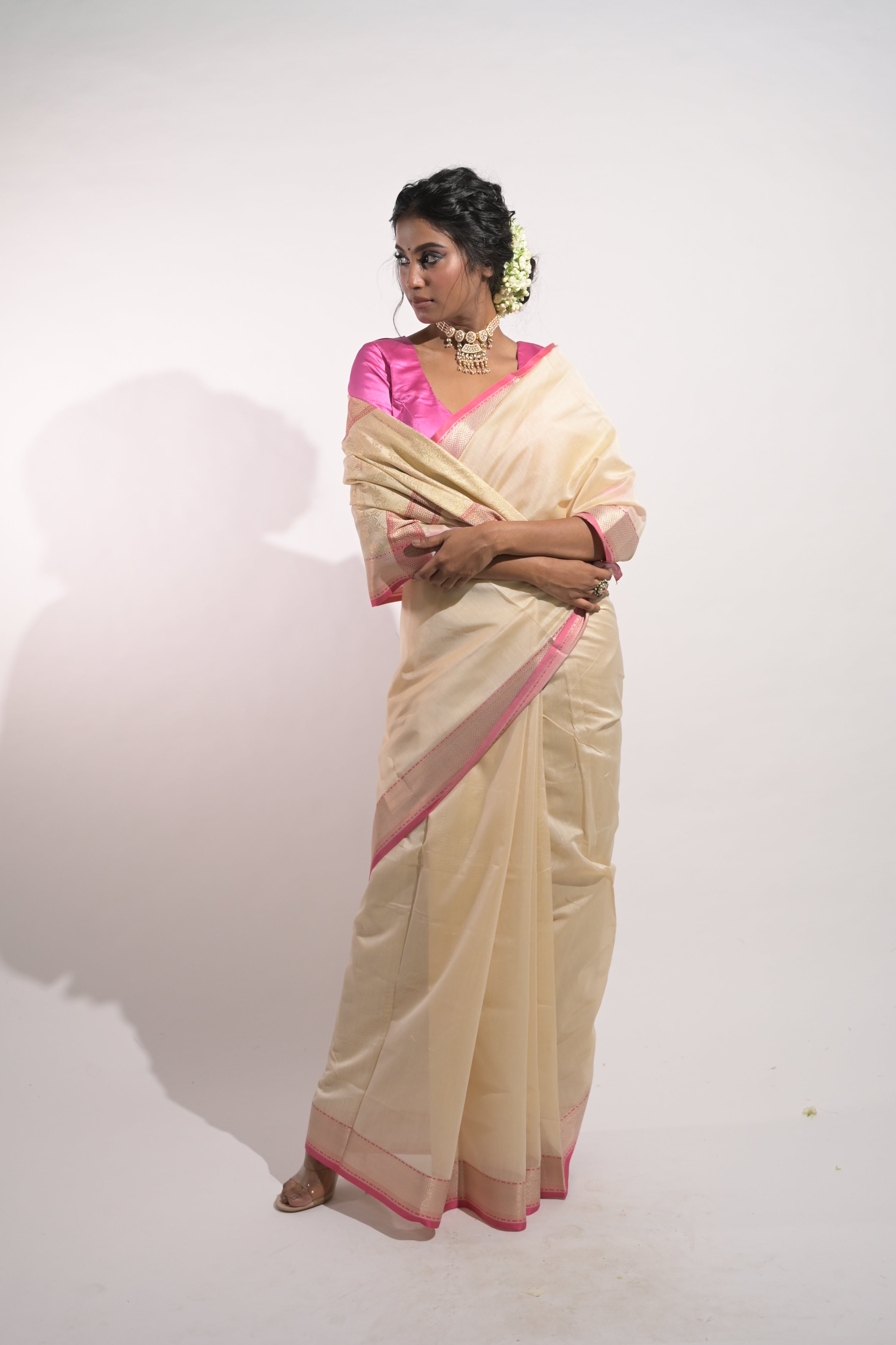 Tanirika I Ivory Handloom Cotton Banarasi Saree with Zari Border and Floral Motifs