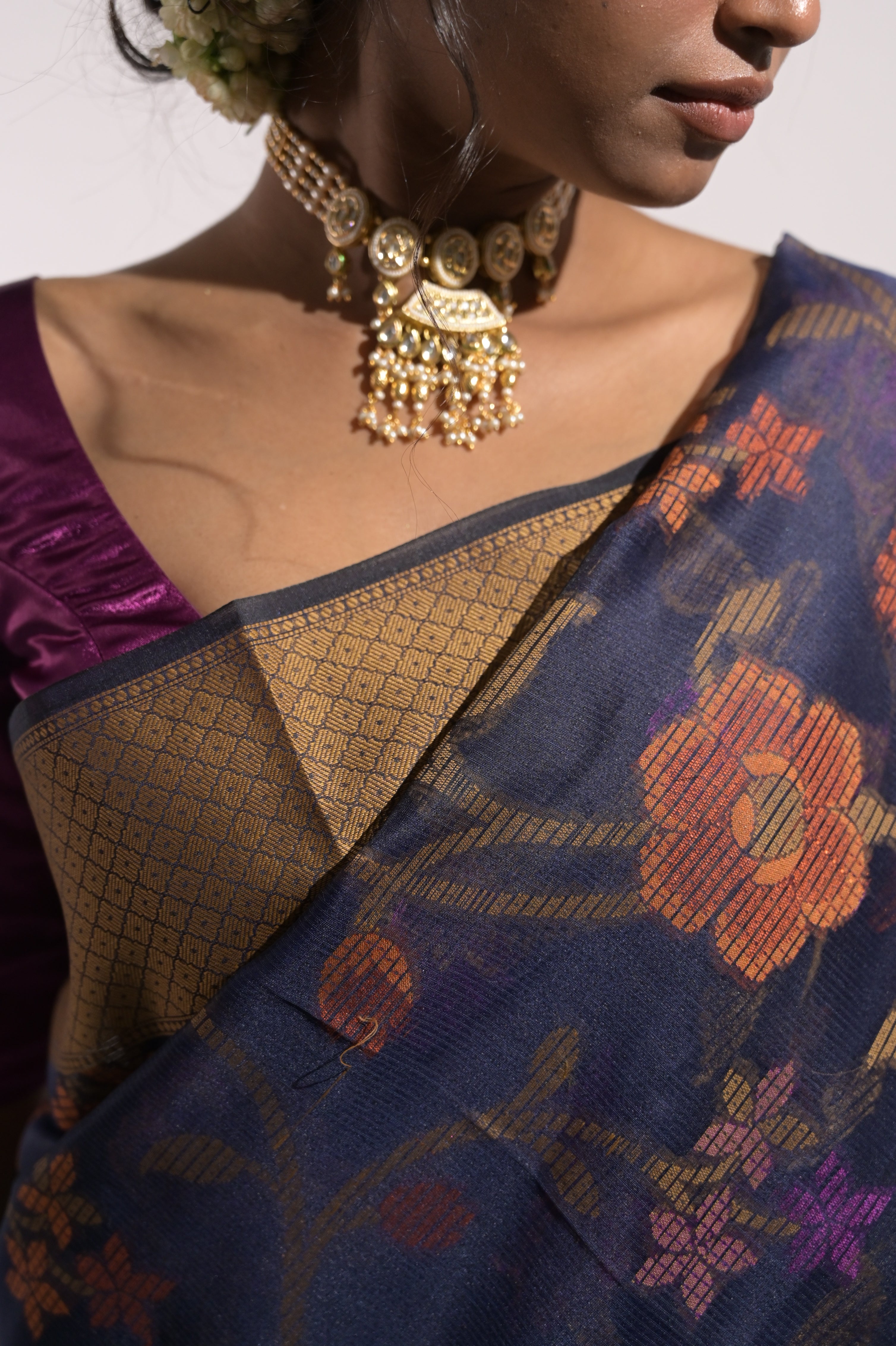 Avanya I Blue Handloom Cotton Saree with Multicolour Floral Jaal Motifs