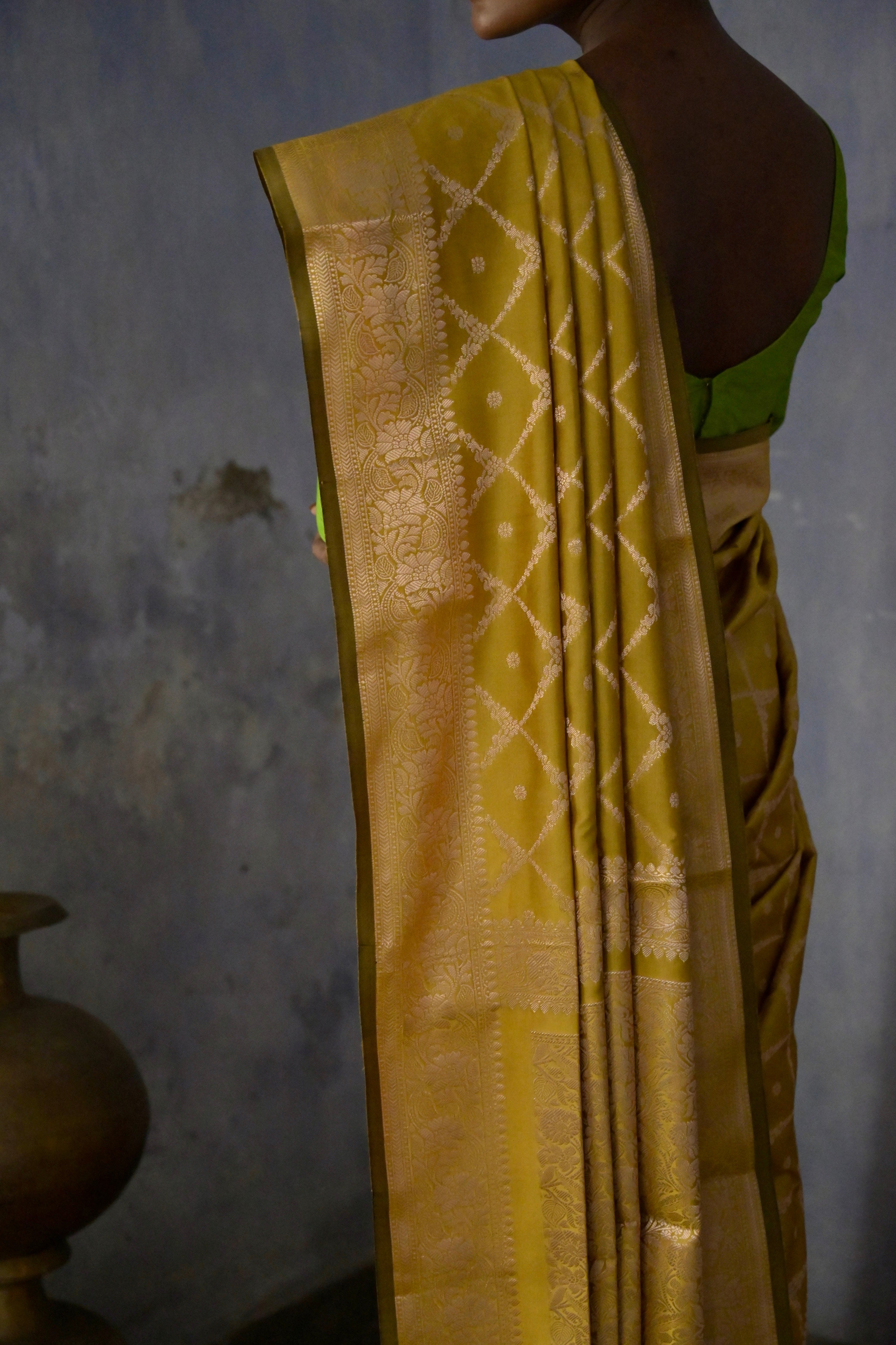Zarban I mustard Handloom silk Jaal Banarasi Saree with floral Zari Border