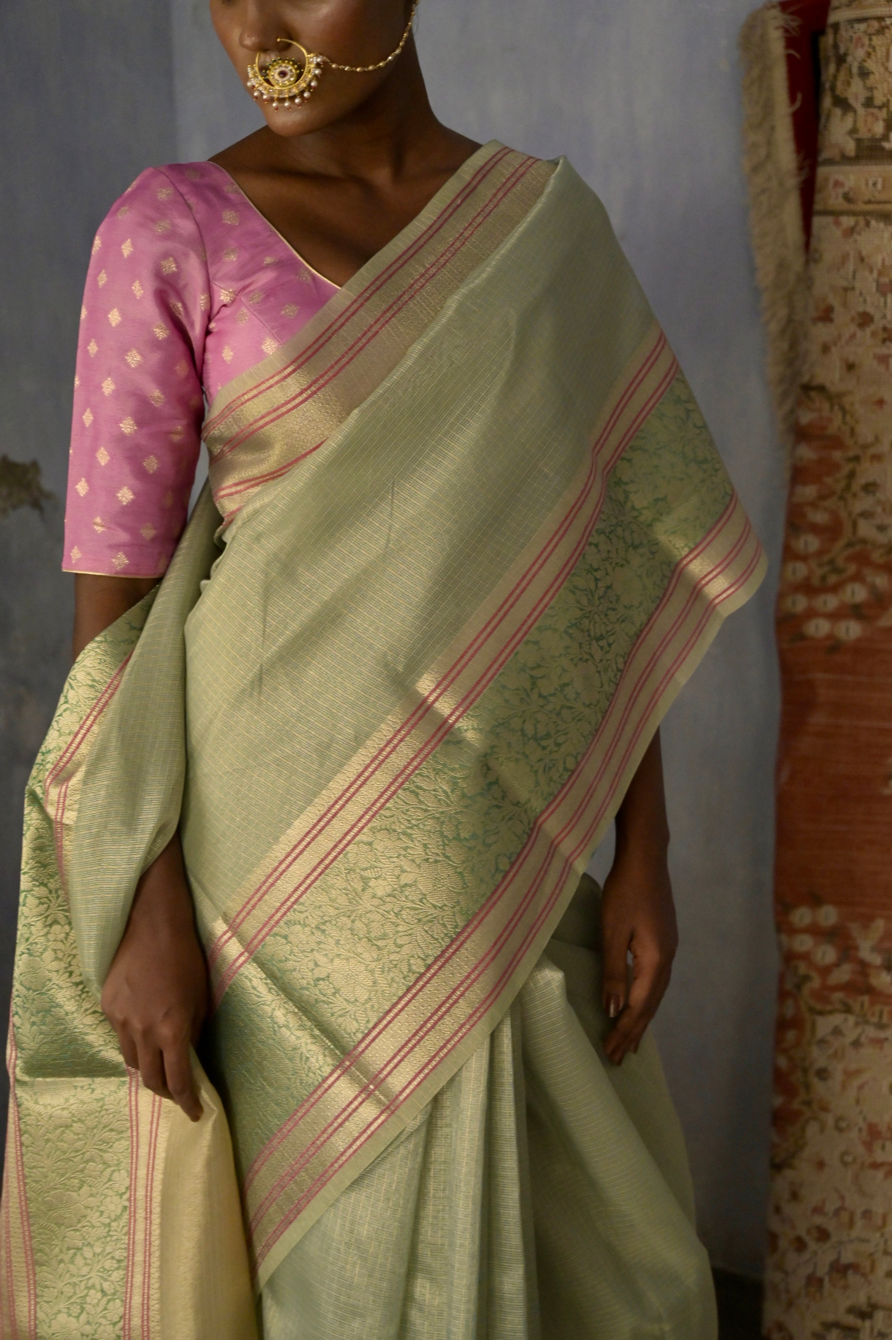 Anandi I Pastel Blue Handloom Kota Banarasi Saree with floral Zari Border