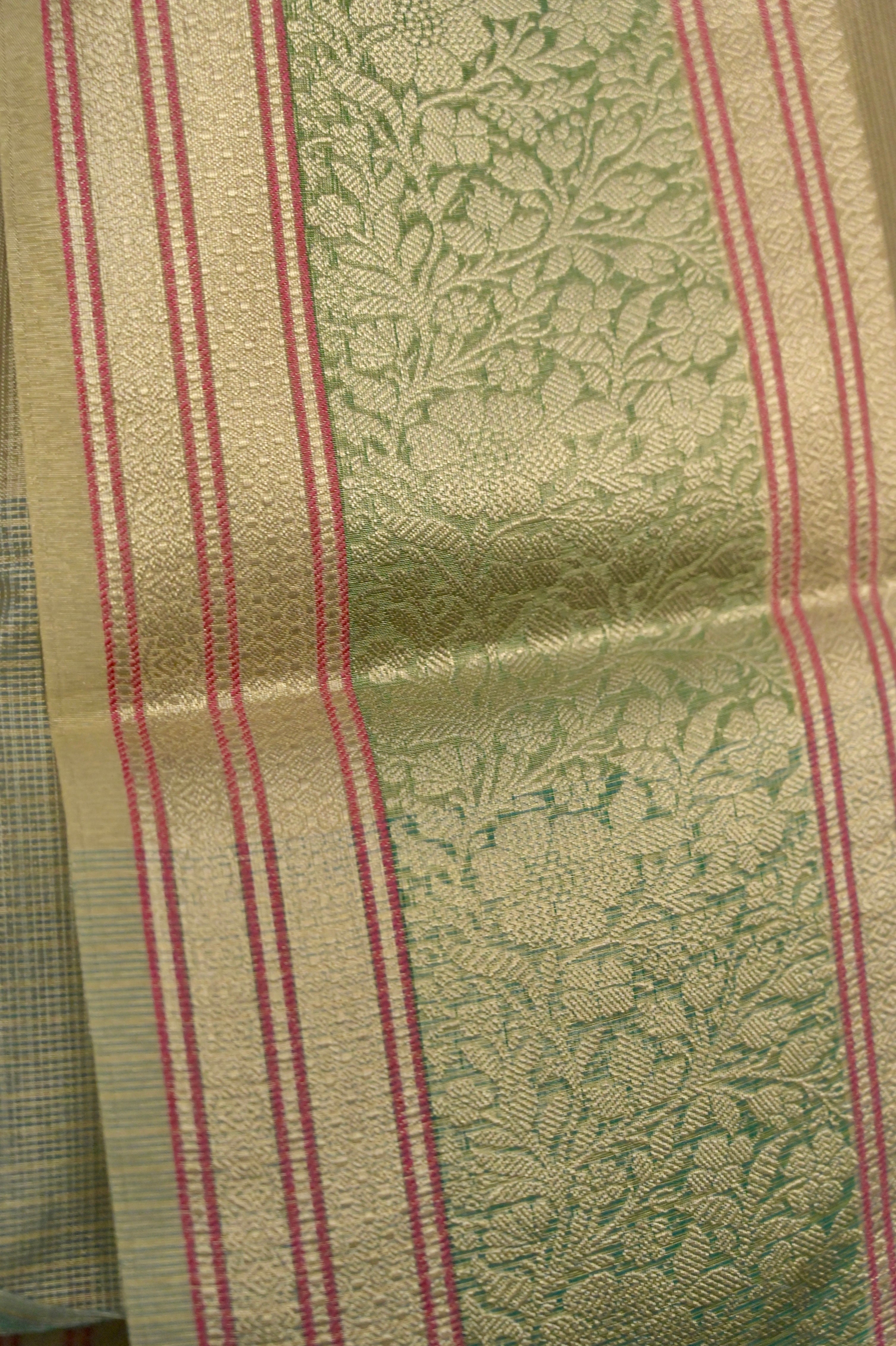 Anandi I Pastel Blue Handloom Kota Banarasi Saree with floral Zari Border