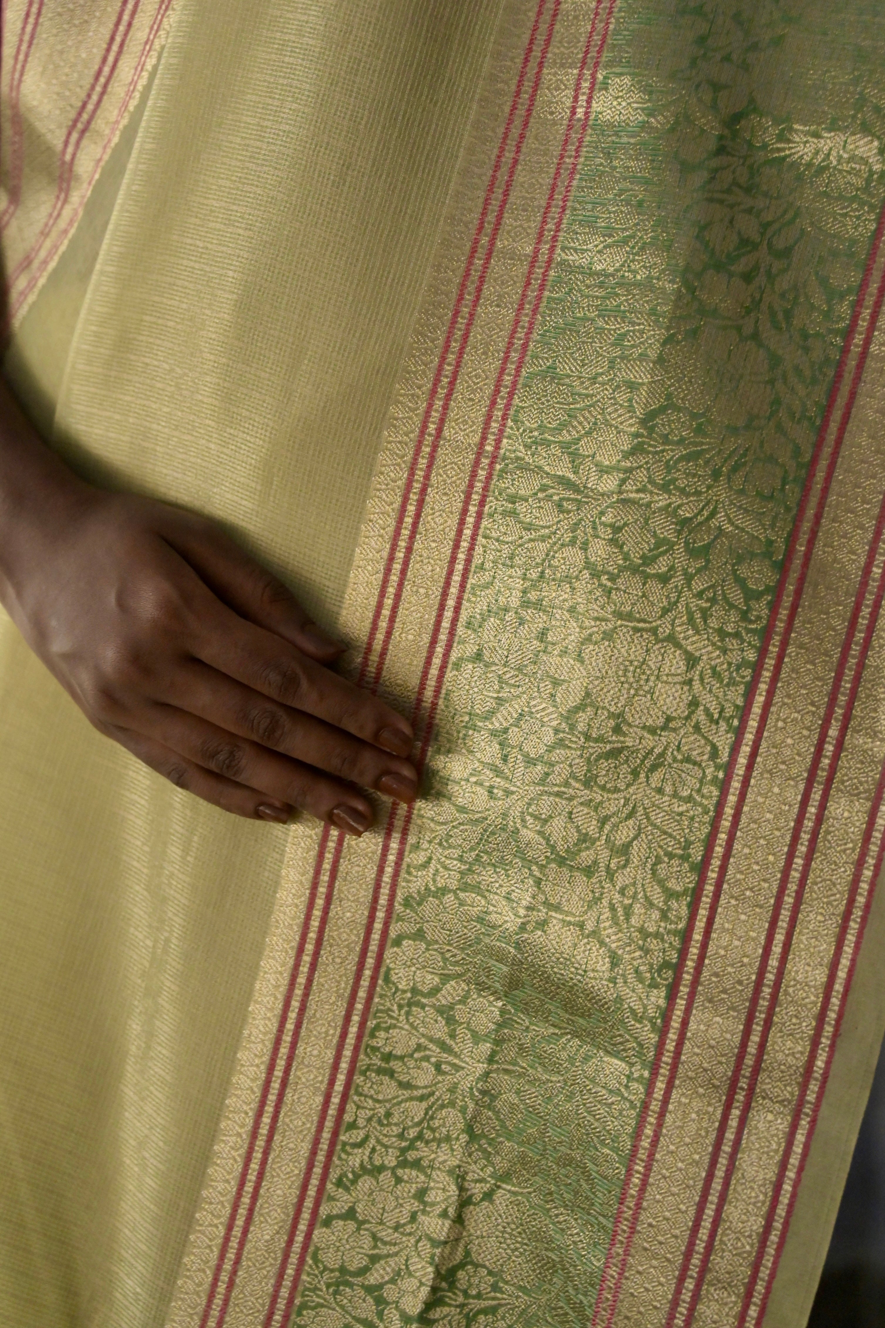 Rangat I Pastel green Handloom Kota Banarasi Saree with floral Zari Border