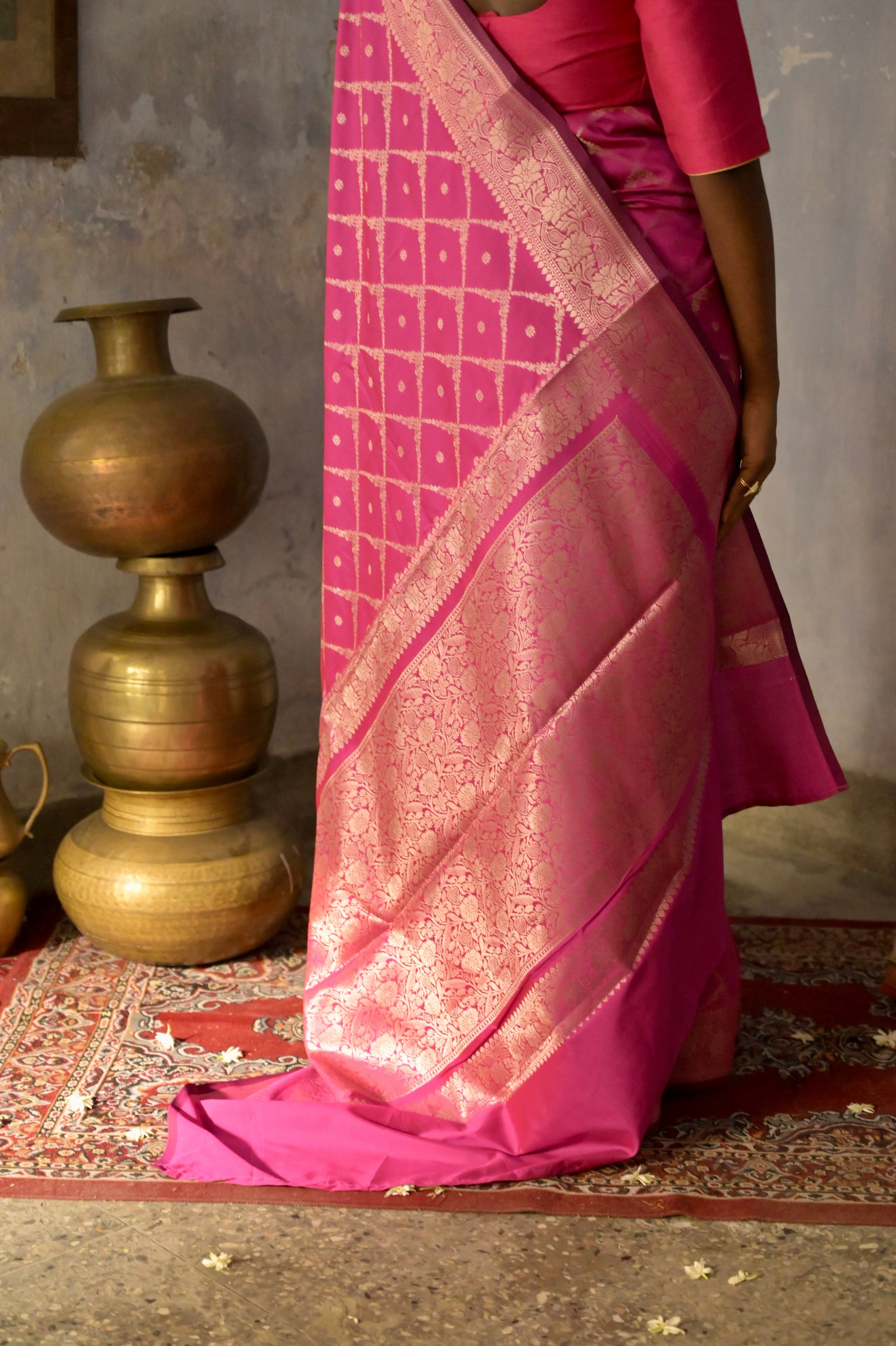 Niyara I Rani pink Handloom silk Jaal Banarasi Saree with floral Zari Border