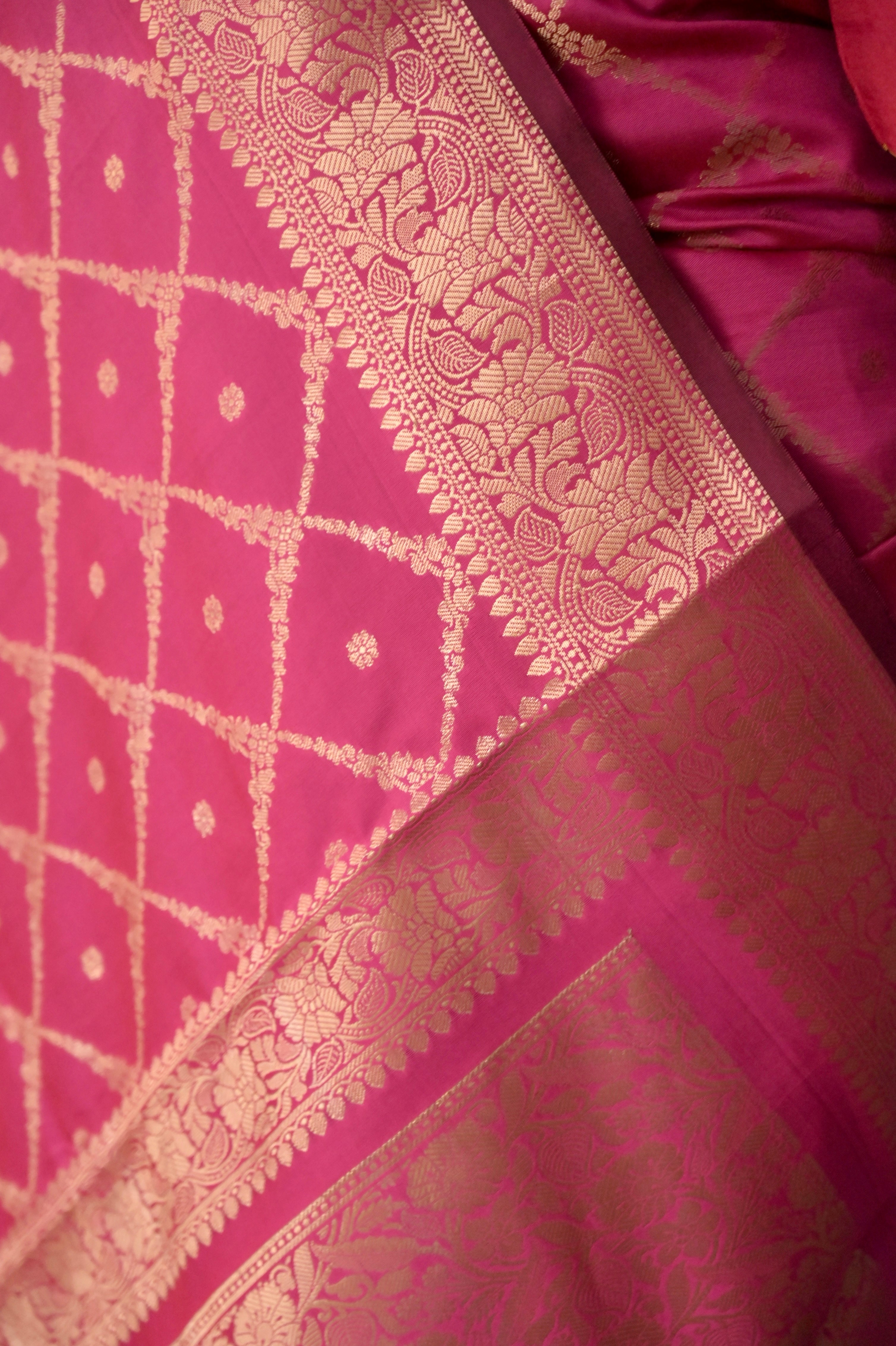 Niyara I Rani pink Handloom silk Jaal Banarasi Saree with floral Zari Border