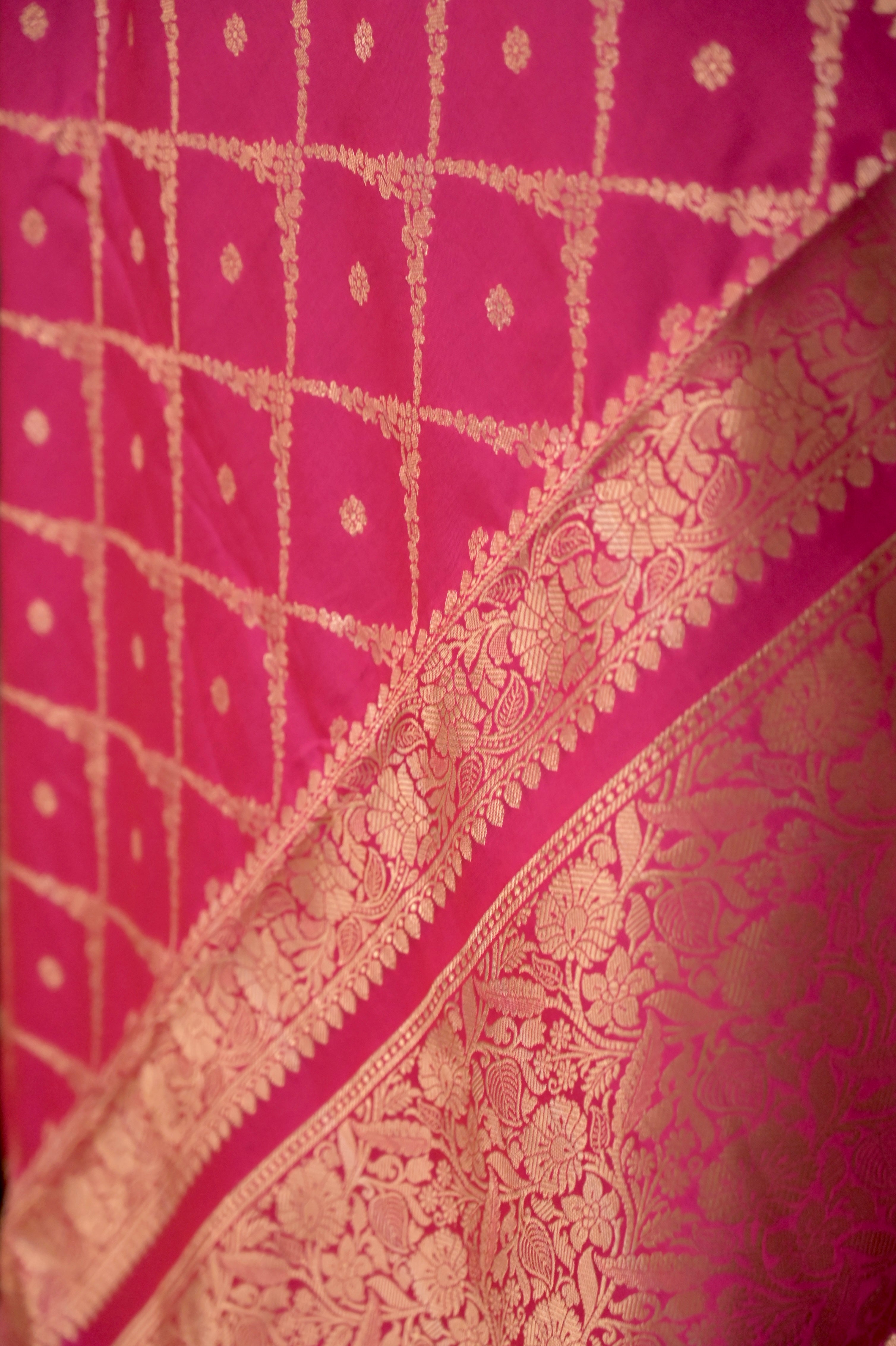 Niyara I Rani pink Handloom silk Jaal Banarasi Saree with floral Zari Border