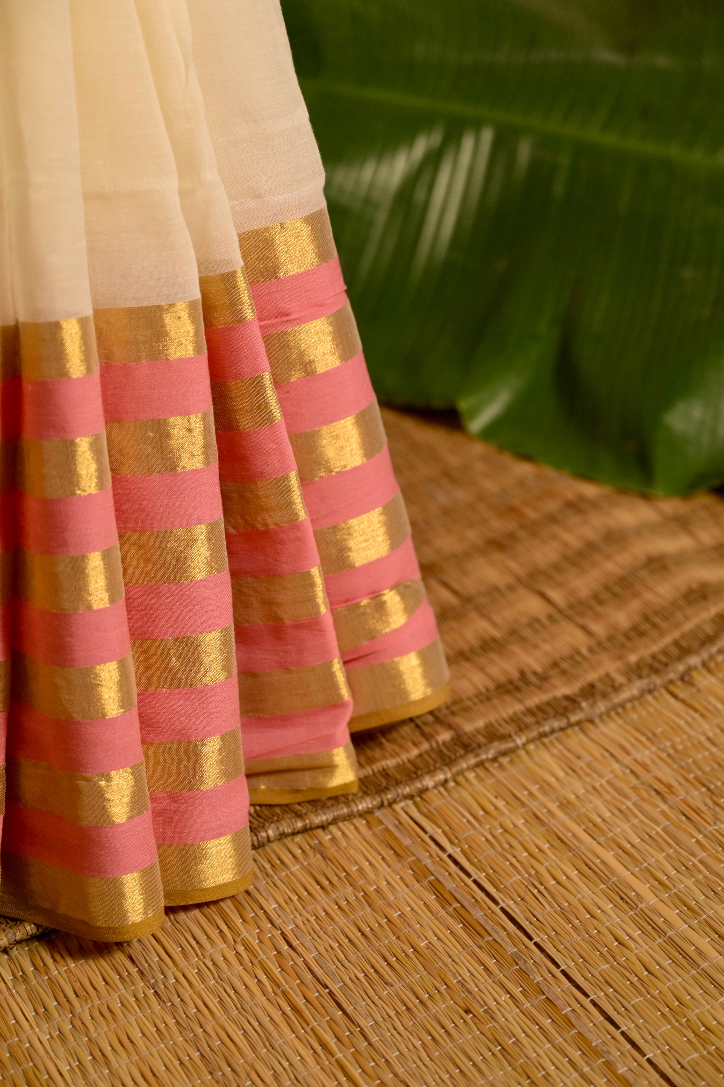 Chandramaya I Cream White Cotton Saree with Pink and Golden Striped Border