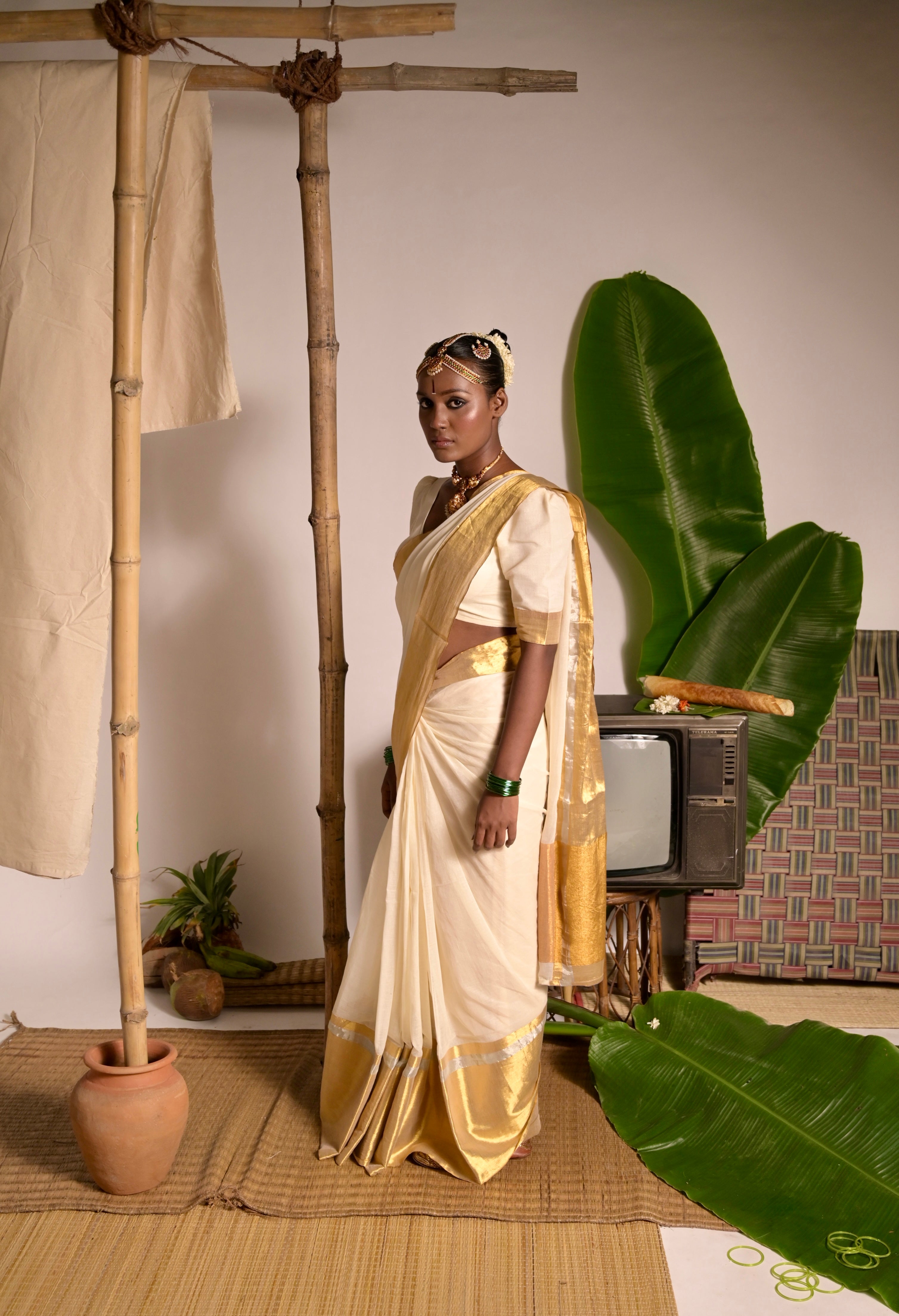 Swarnamaya I Off white mul cotton handwoven saree with golden border