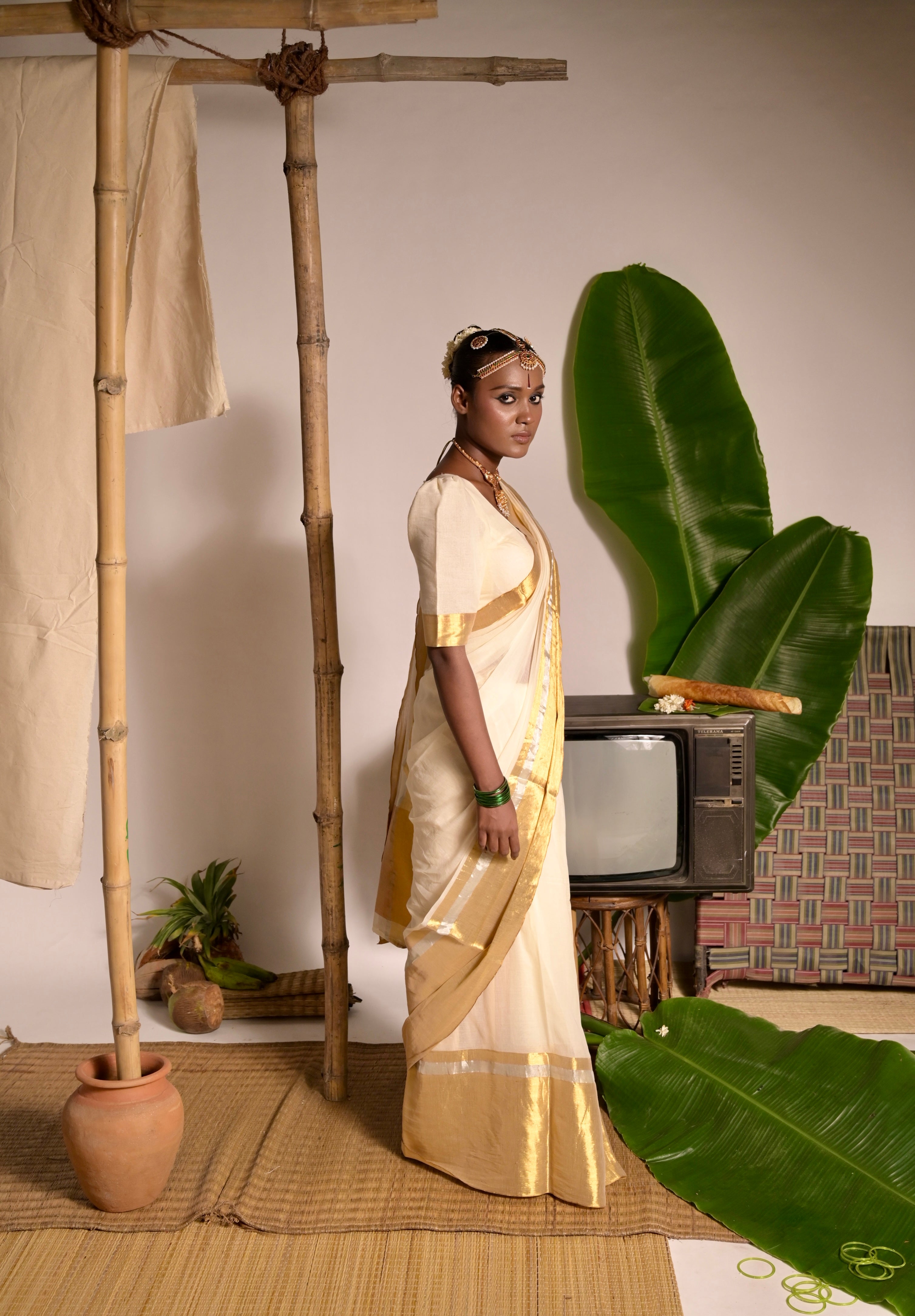 Swarnamaya I Off white mul cotton handwoven saree with golden border