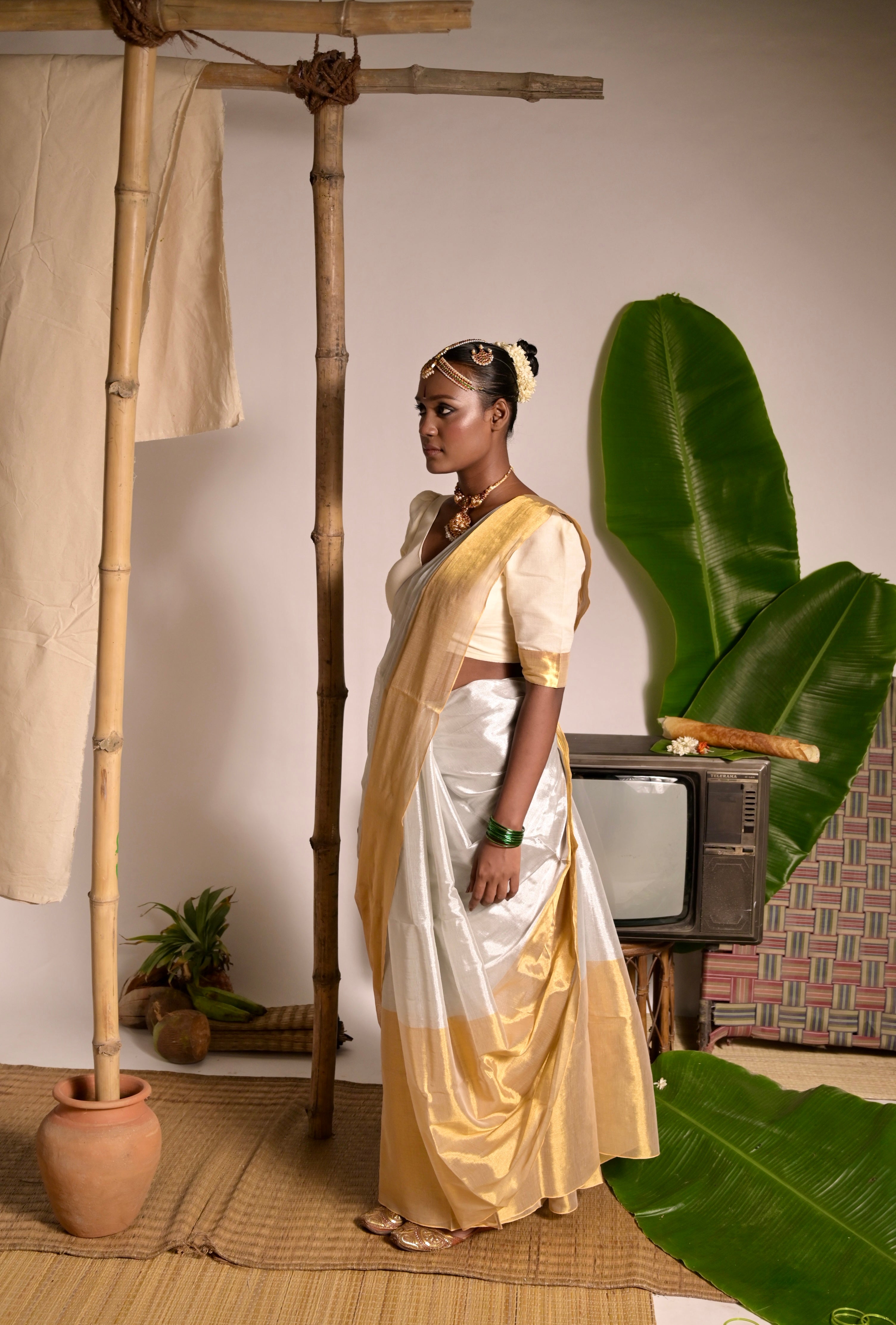 Kanakvarna I Metallic White and Gold Tissue Saree