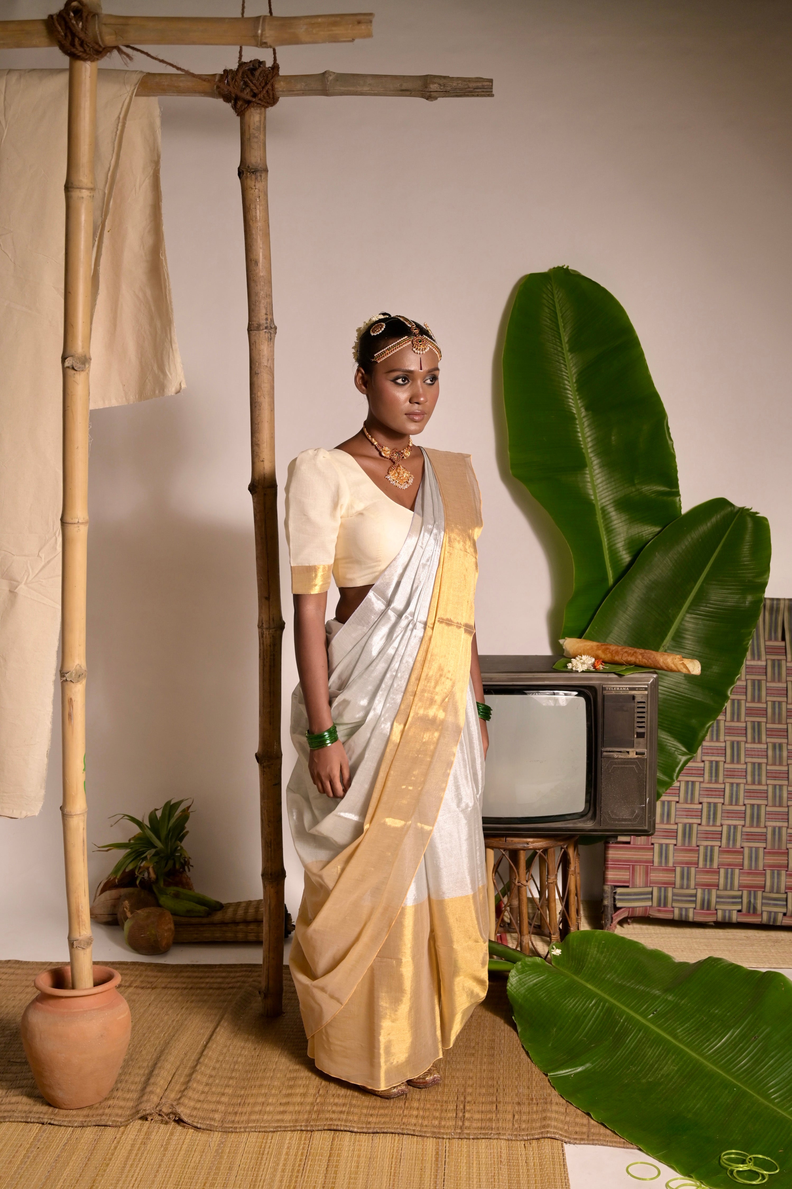 Kanakvarna I Metallic White and Gold Tissue Saree