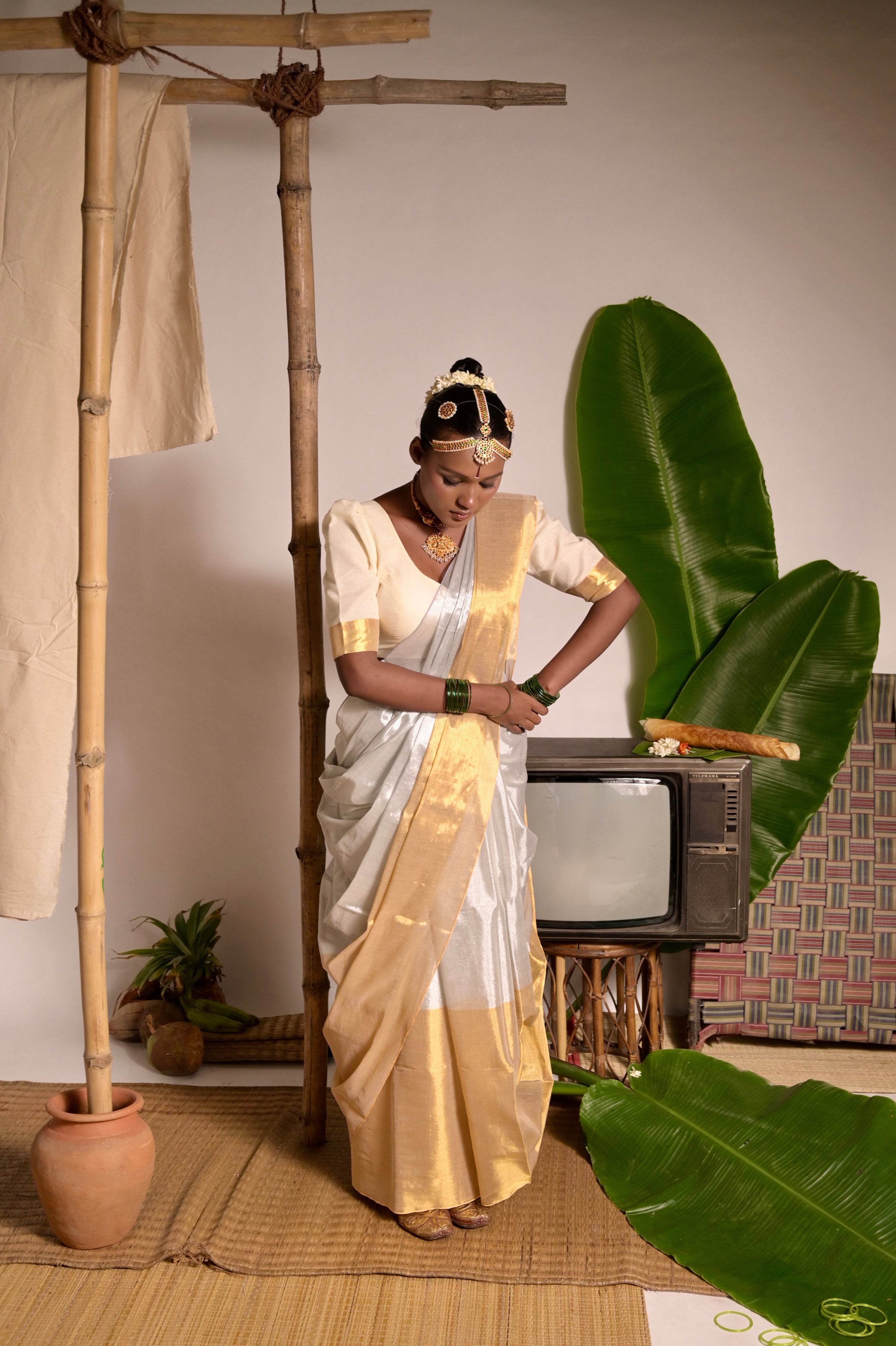 Kanakvarna I Metallic White and Gold Tissue Saree