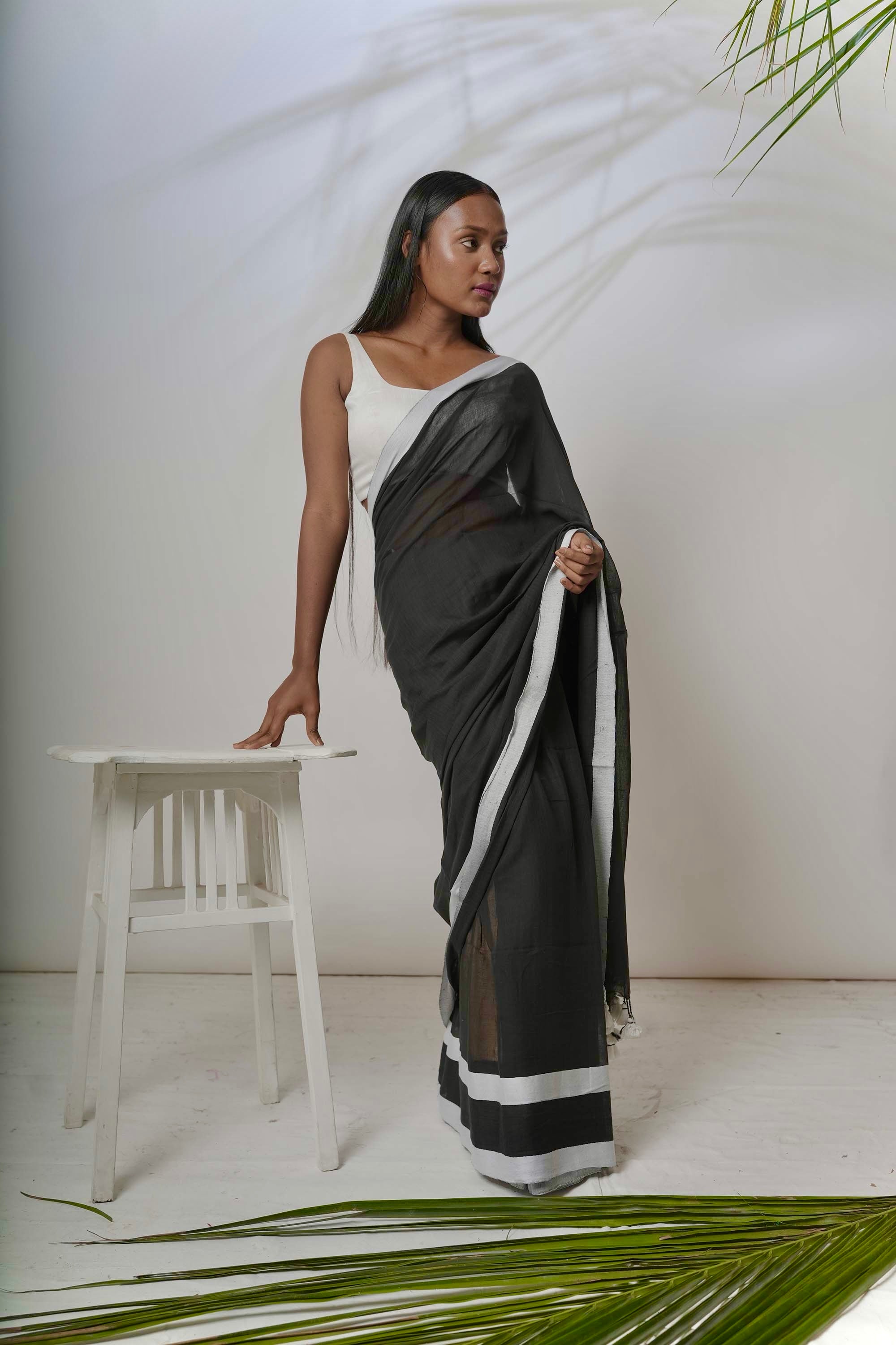 Enigma I Black cotton handloom saree with white  border
