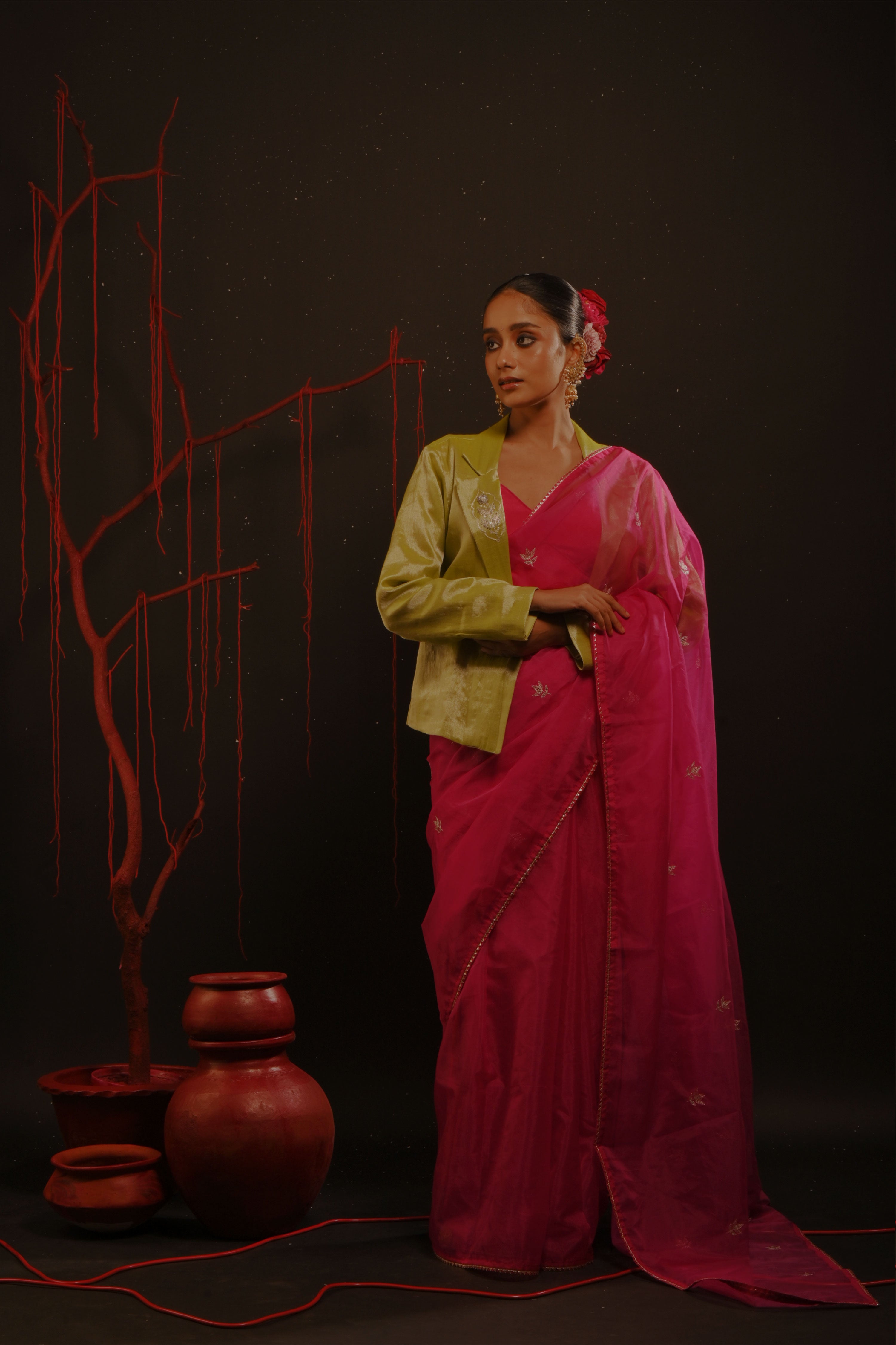 Gulmira I Fuchsia pink organza saree paired with pink chinon blouse and Tissue jacket