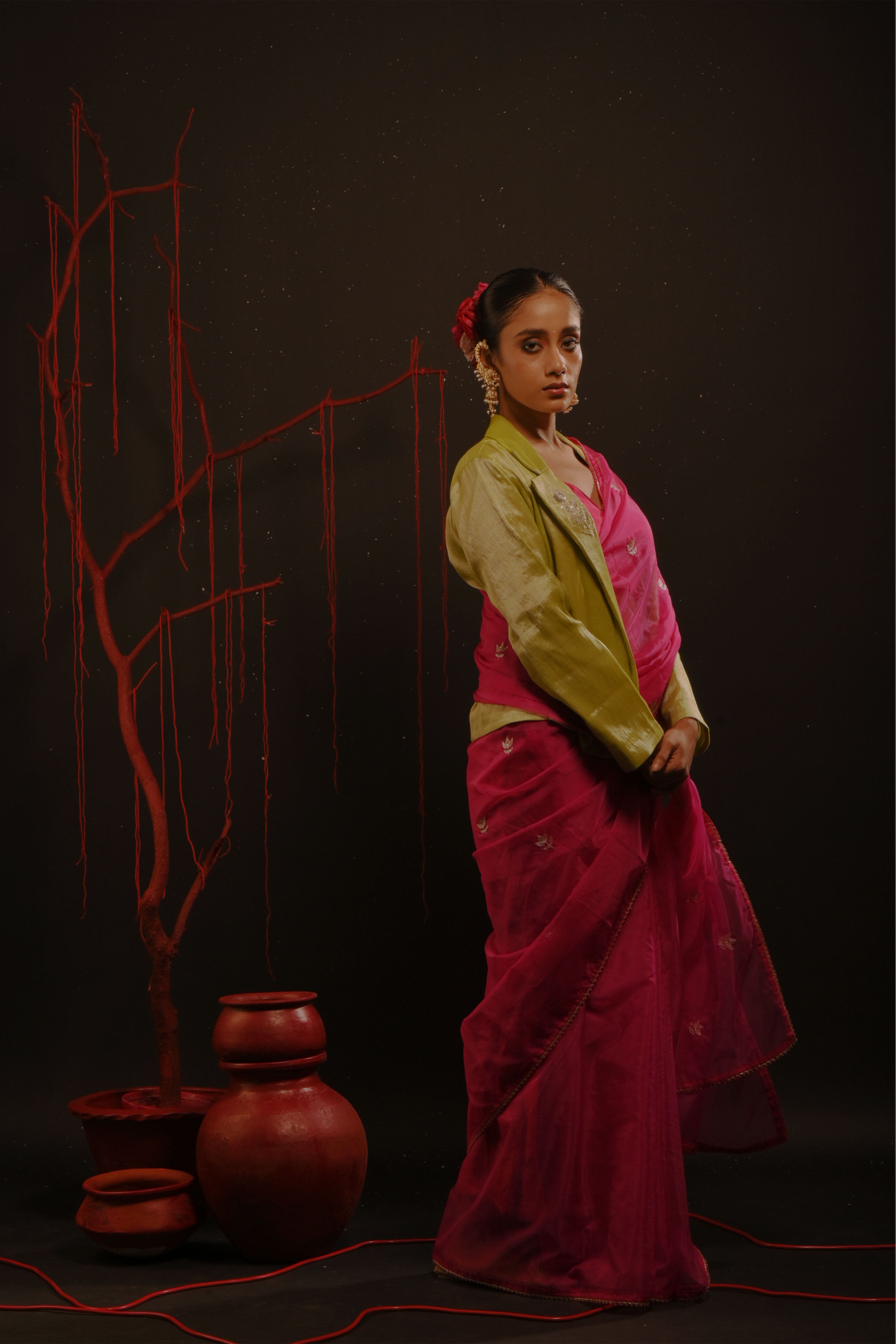 Gulmira I Fuchsia pink organza saree paired with pink chinon blouse and Tissue jacket