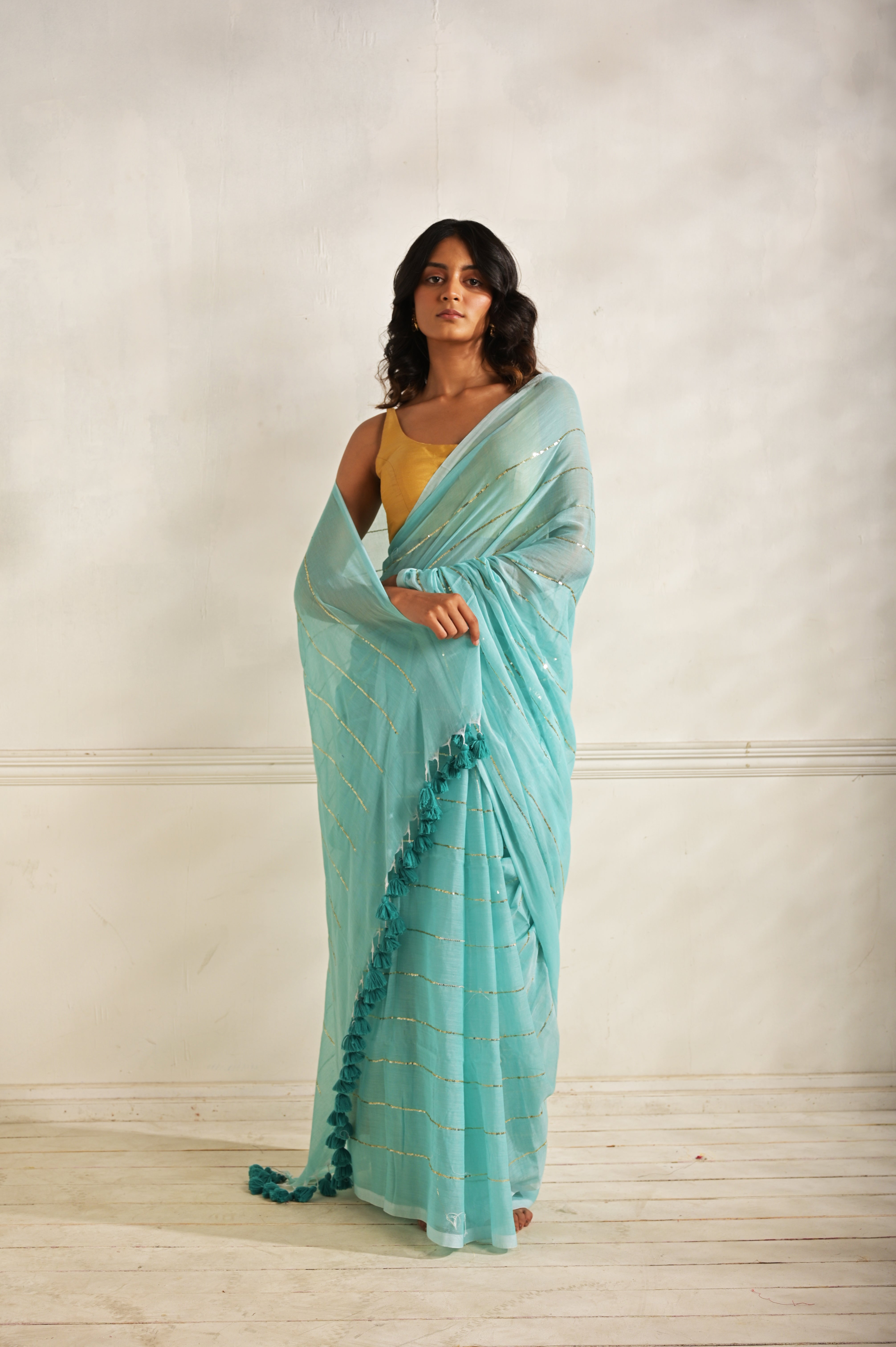 Kaya | Blue handloom mul cotton saree with sequined lines