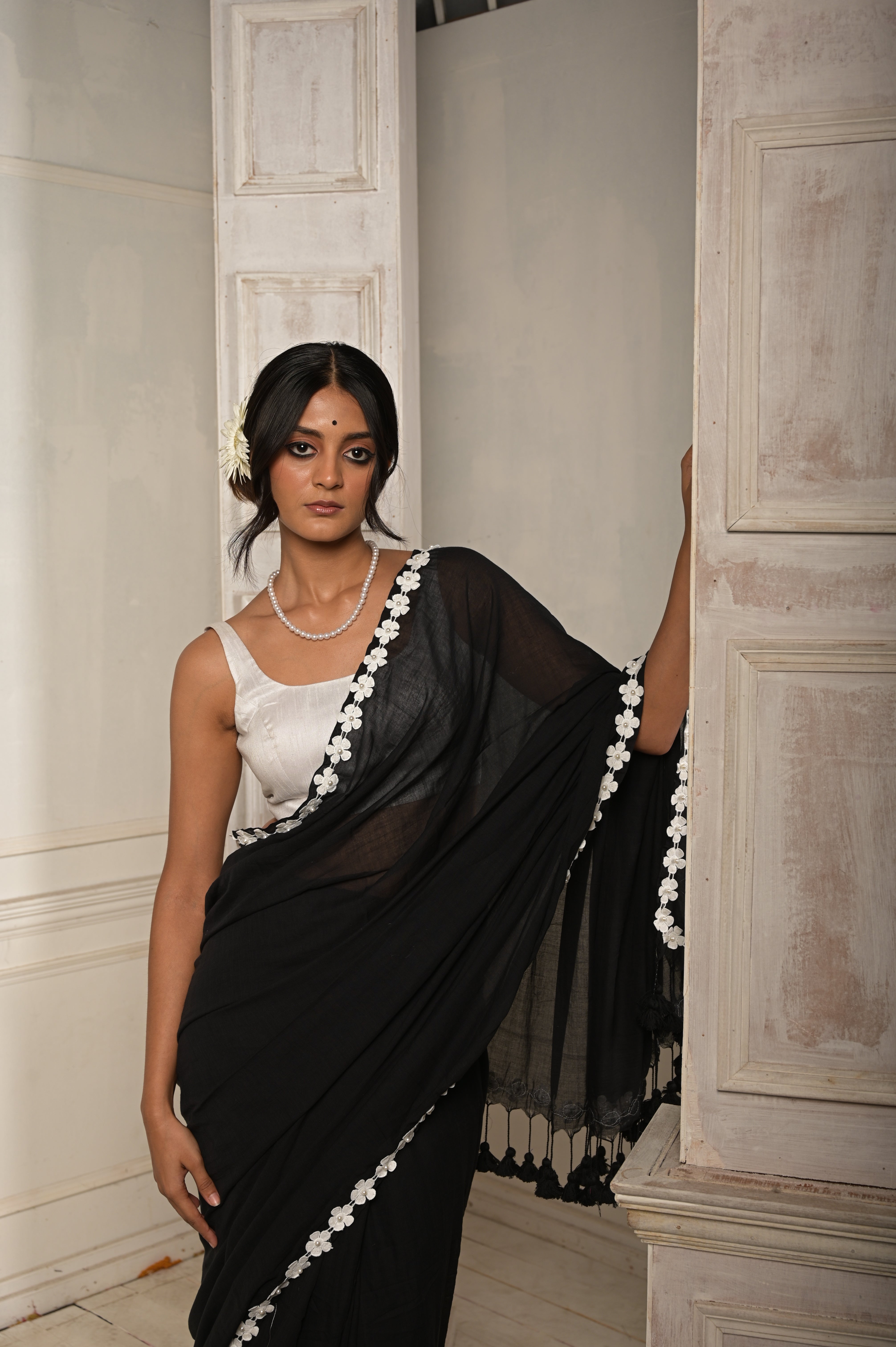 Nishi Raat I Black cotton saree with stitched lace floral embroidered border