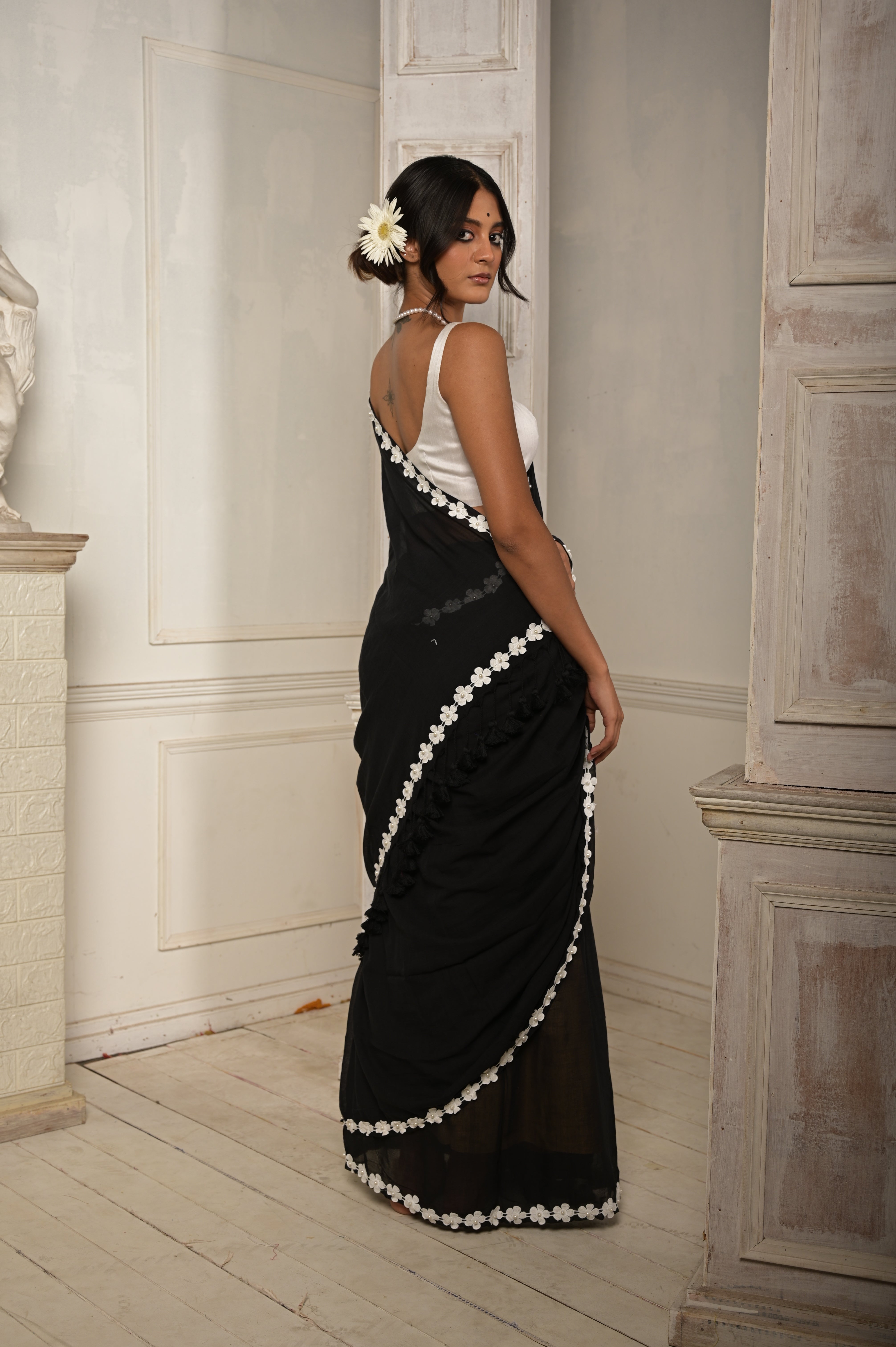 Nishi Raat | Black cotton saree with stitched lace floral embroidered border