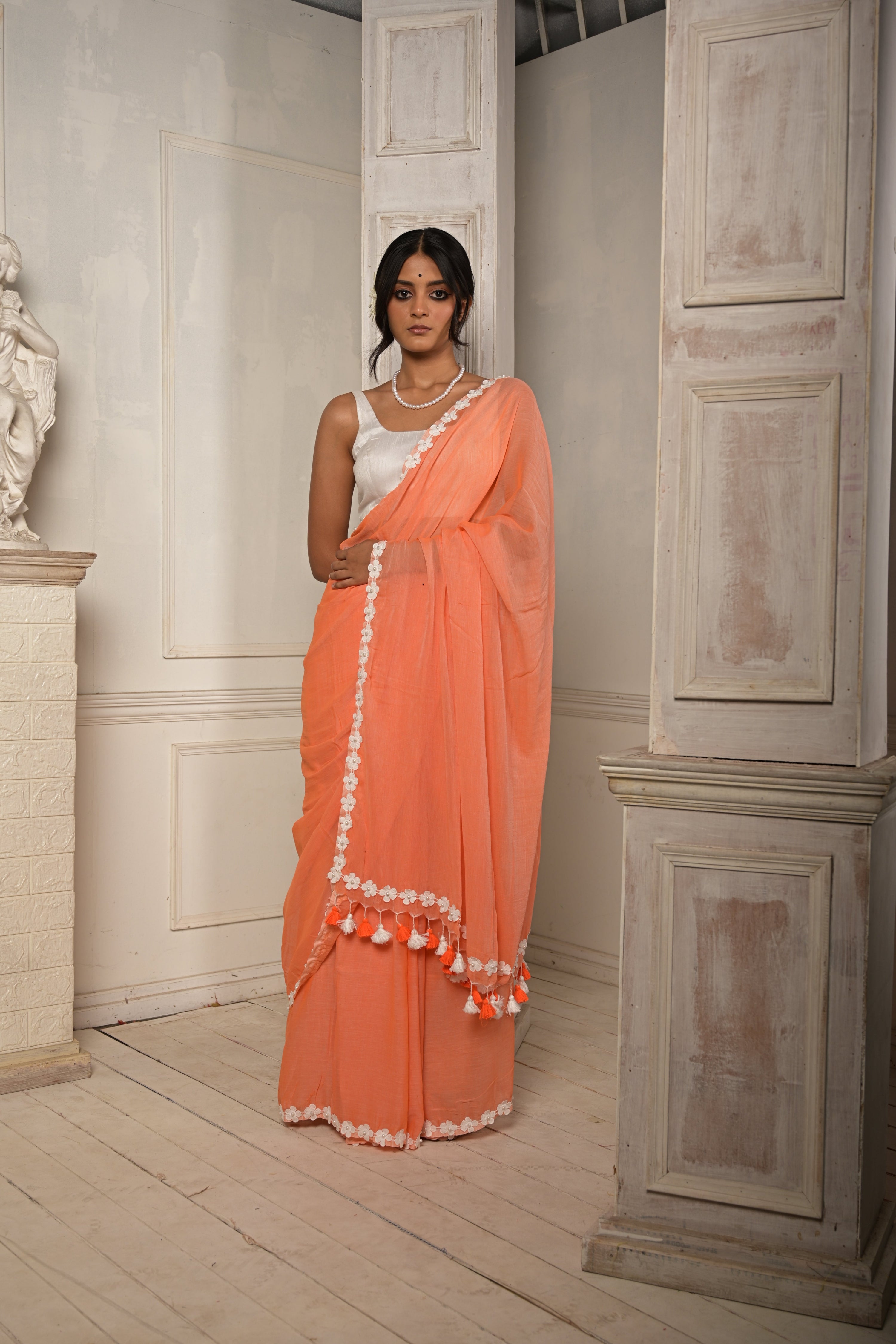 Surbhi shaam | Peach cotton saree with stitched lace floral embroidered border