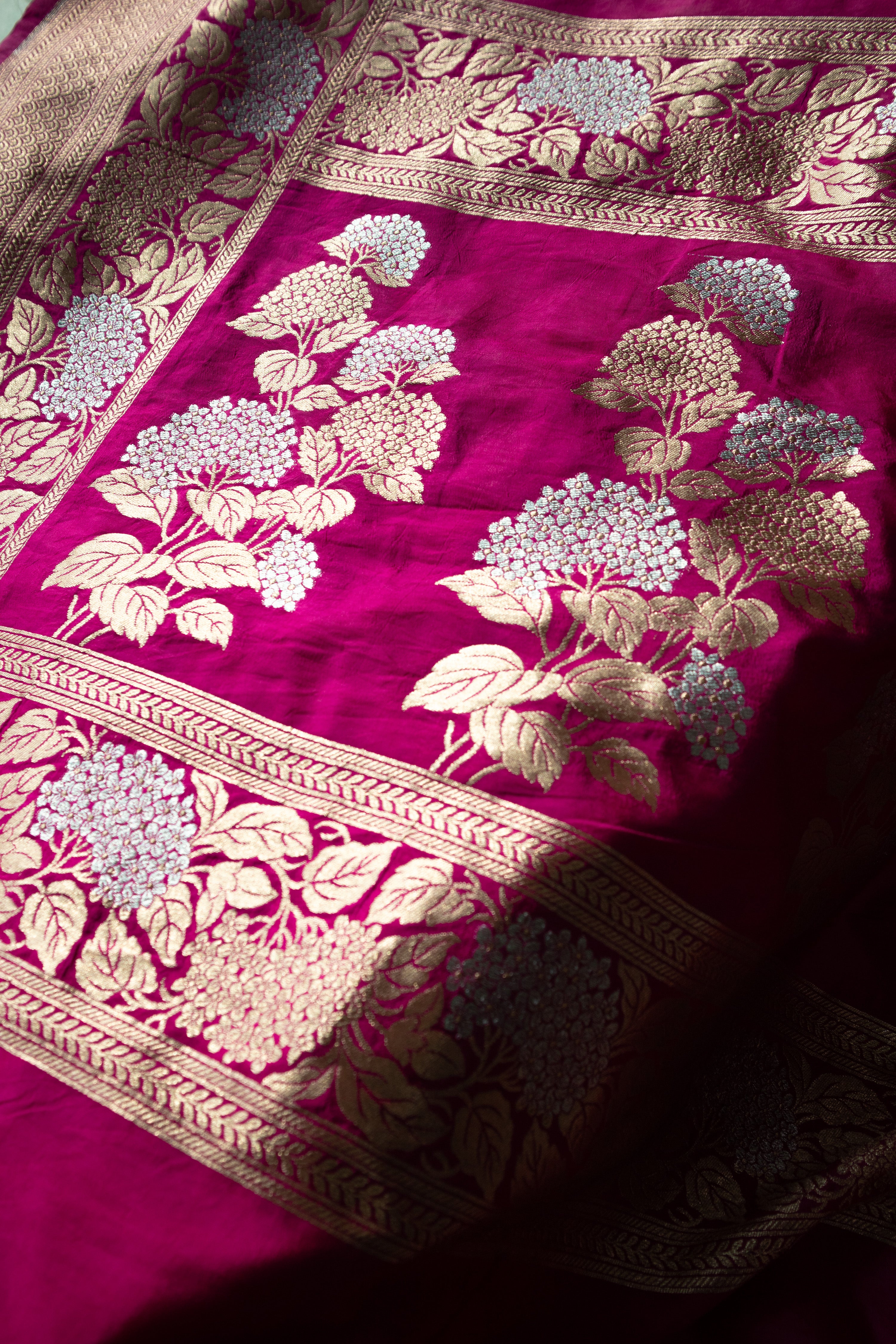 Mridangini I Fuchsia Pink Handwoven Katan Banarasi Saree with Floral Jaal Zari Border and Hemp Butas