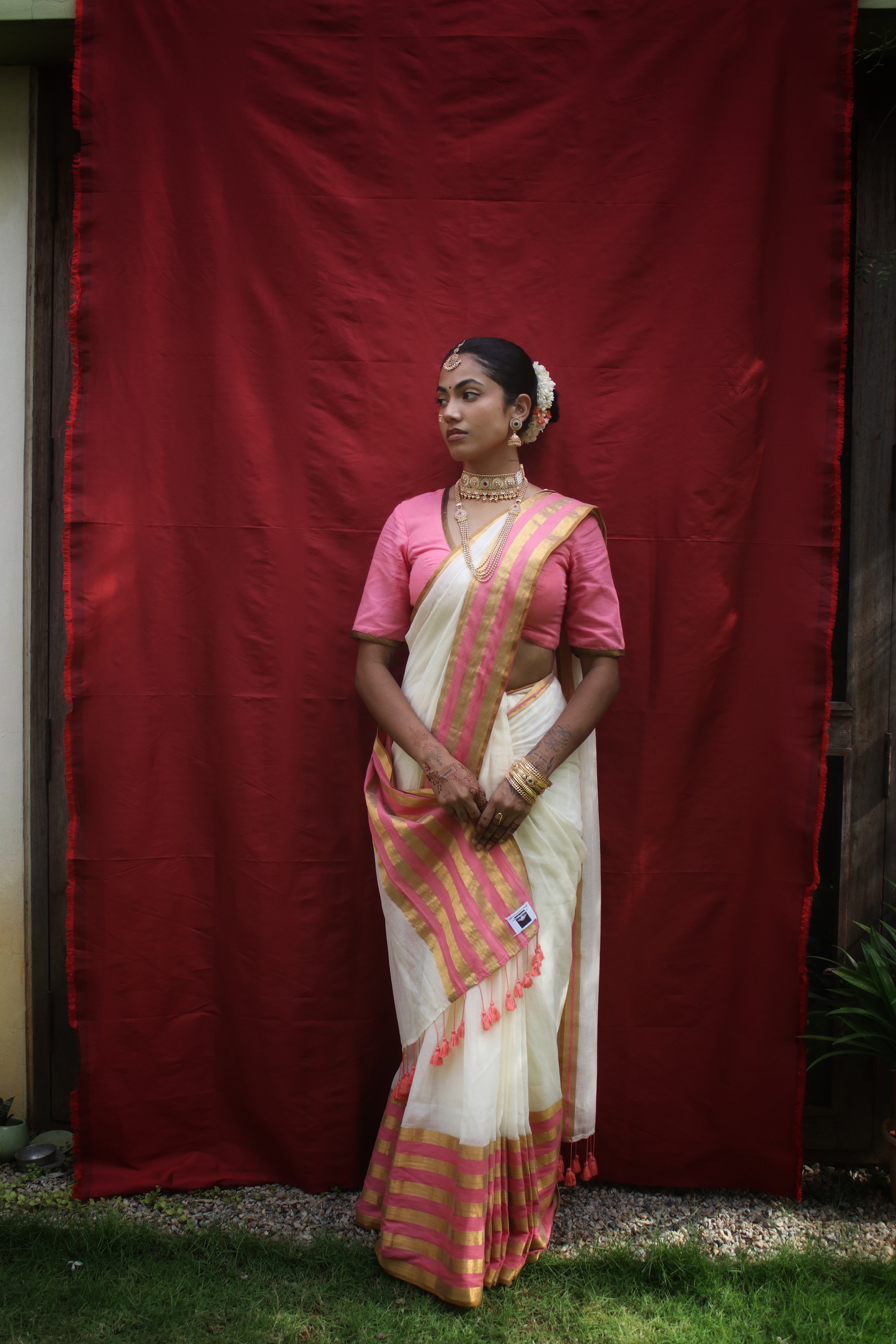 Chandramaya I Cream White Cotton Saree with Pink and Golden Striped Border