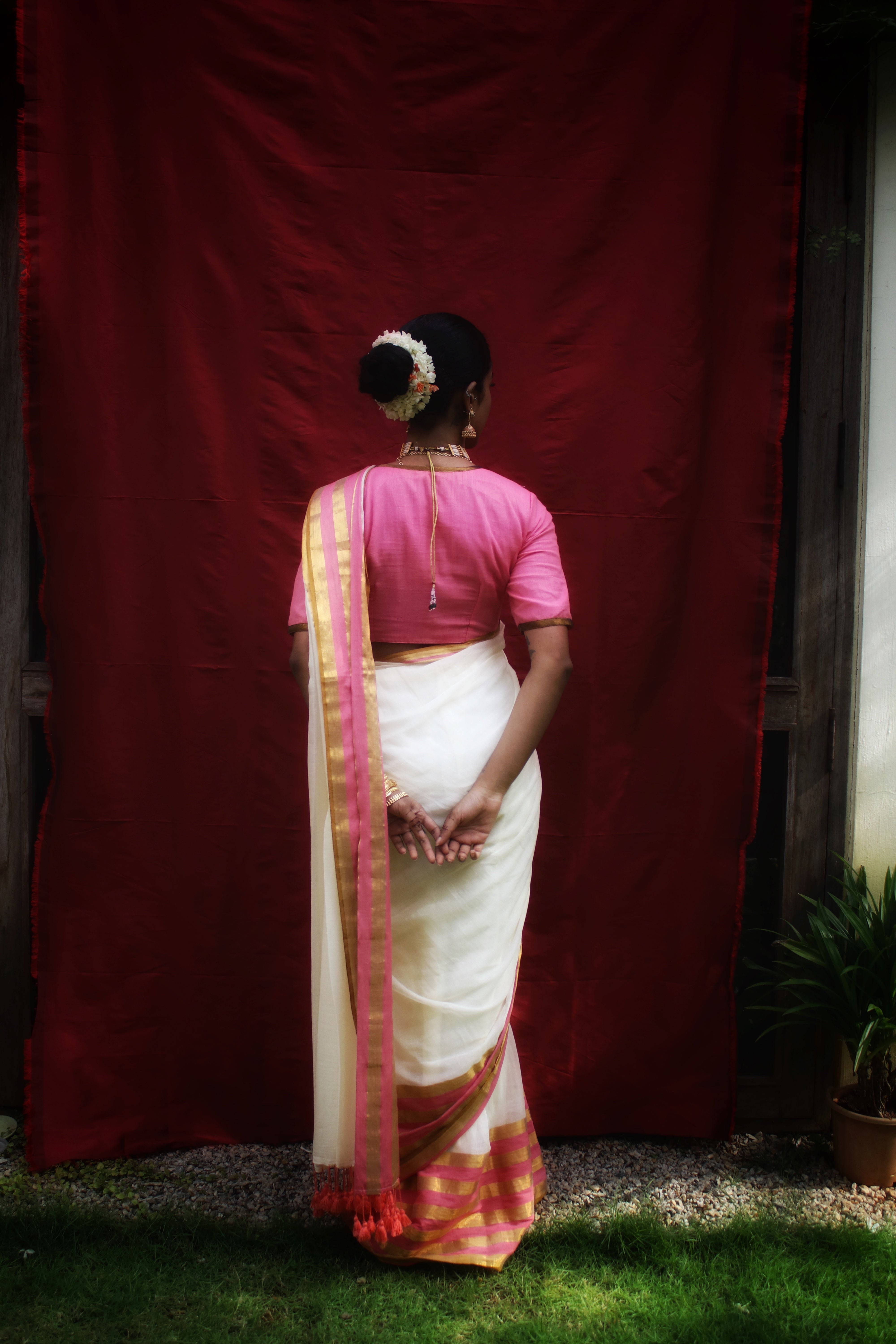 Chandramaya I Cream White Cotton Saree with Pink and Golden Striped Border