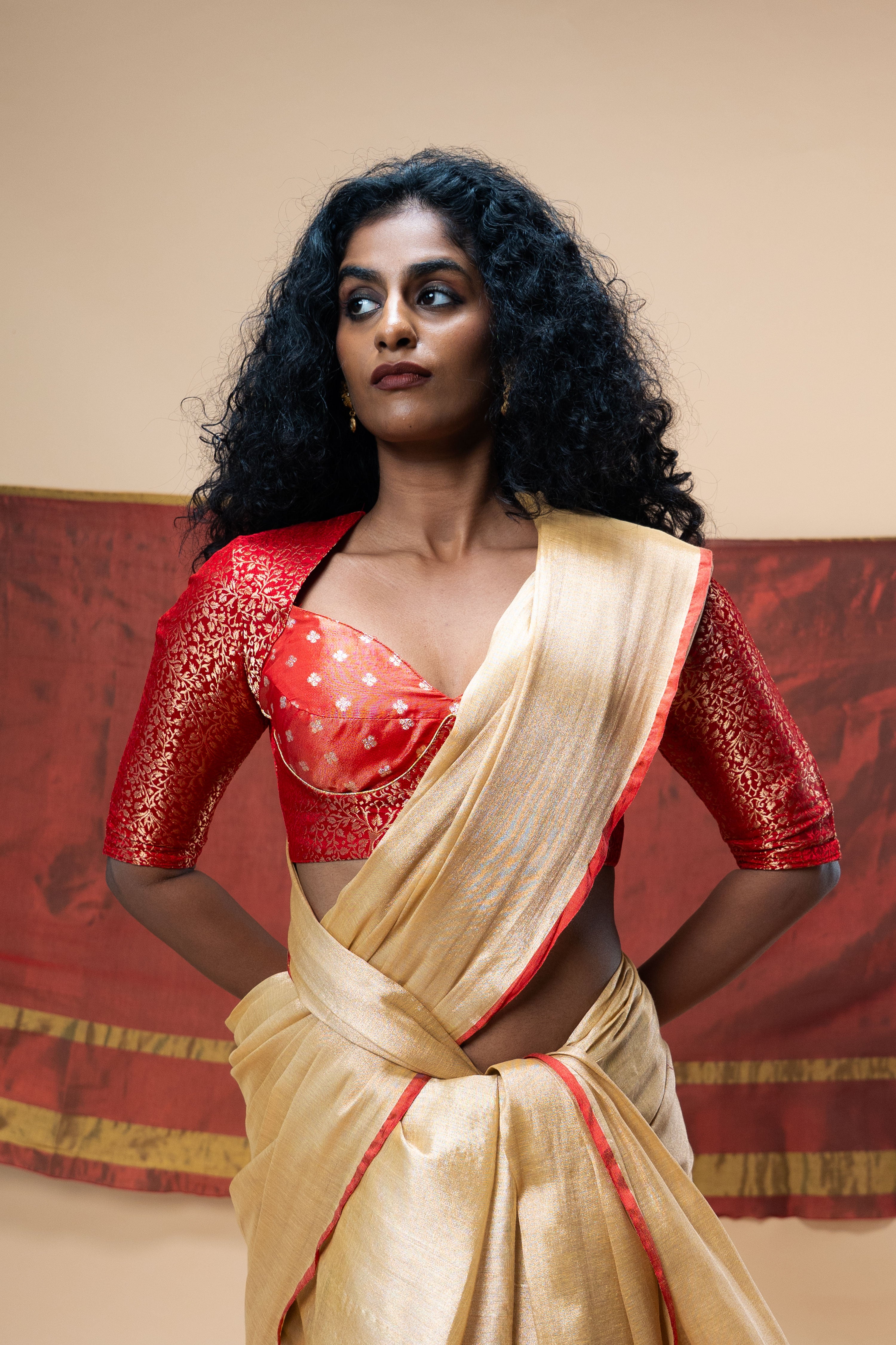 MRIGANI I Red brocade silk blouse with sweetheart neck