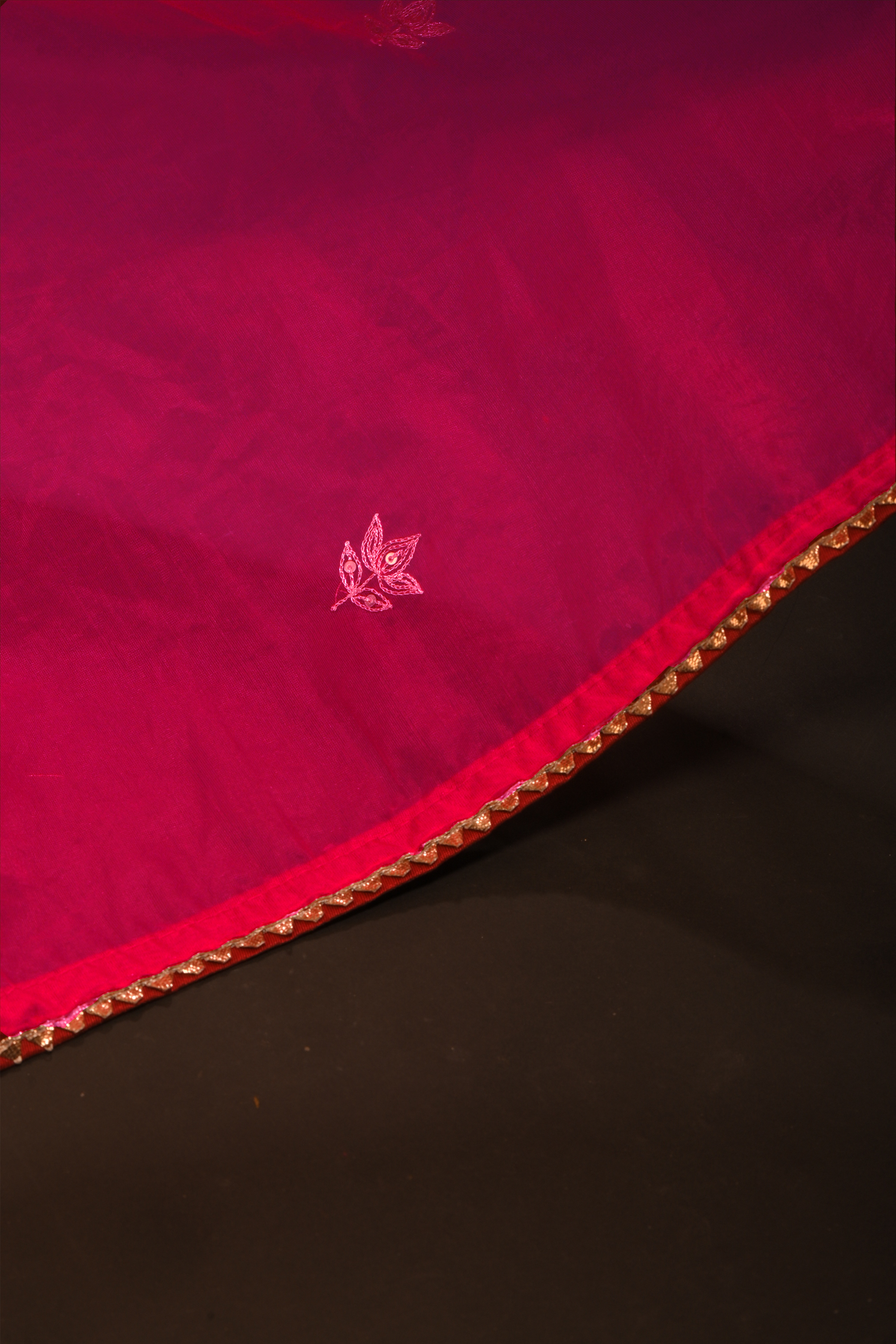 Gulmira I Fuchsia pink organza saree paired with pink chinon blouse and Tissue jacket