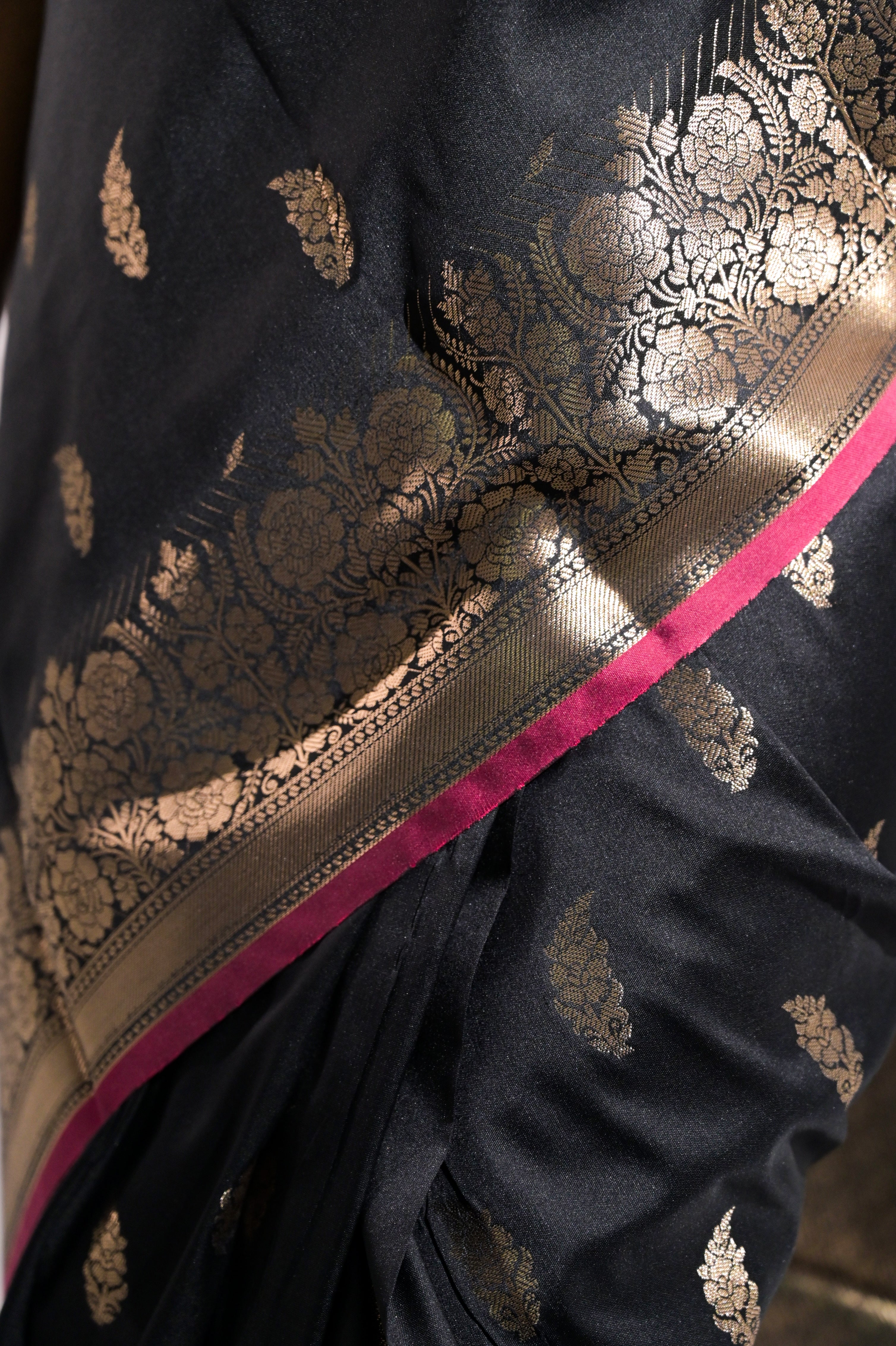 Sargam Sitara I Black Handloom Silk Banarasi Saree with floral zari border and Butis
