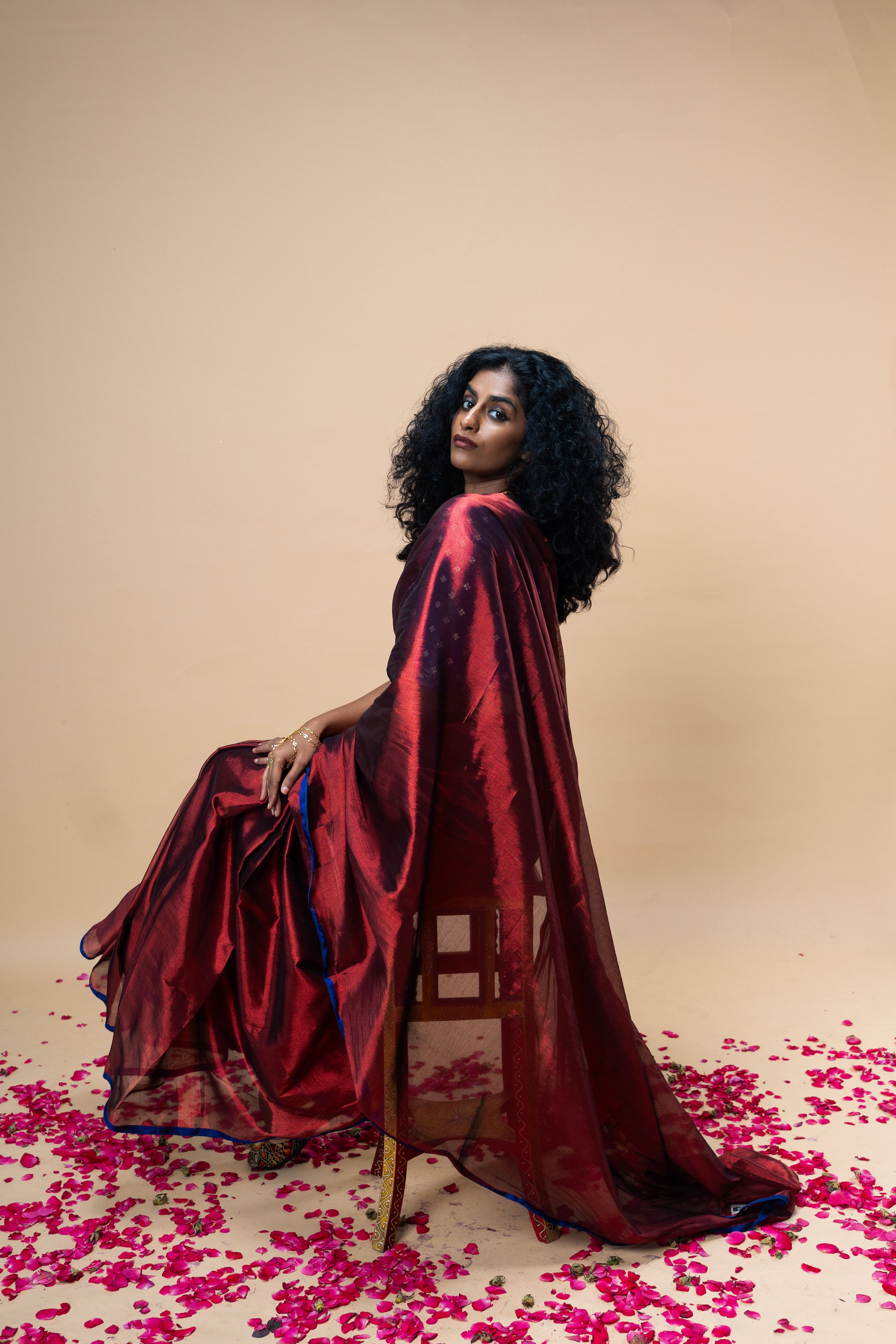 TANVYA I Red handwoven tissue saree with blue border