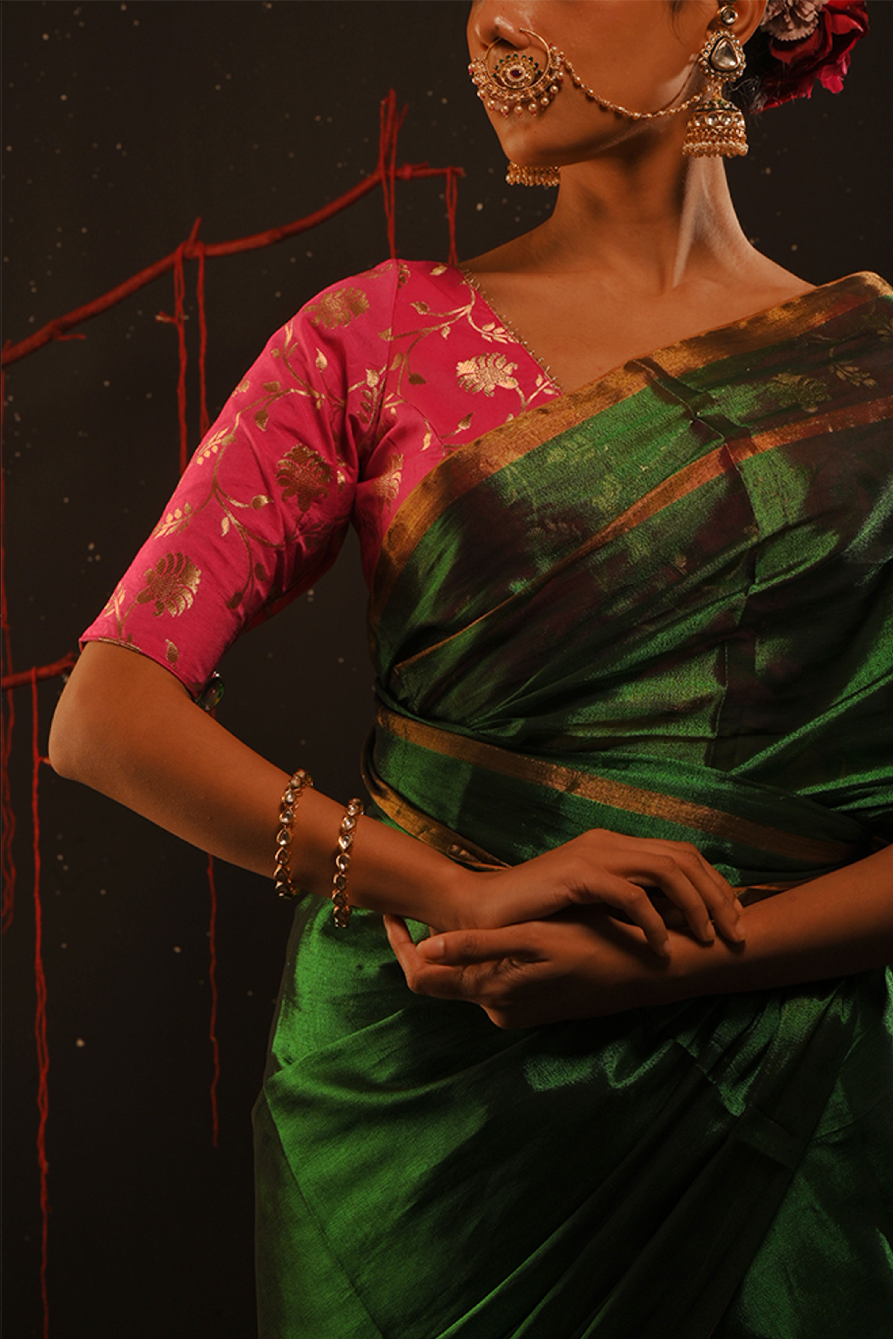 Chitrani I Green handwoven tissue saree with gold striped border